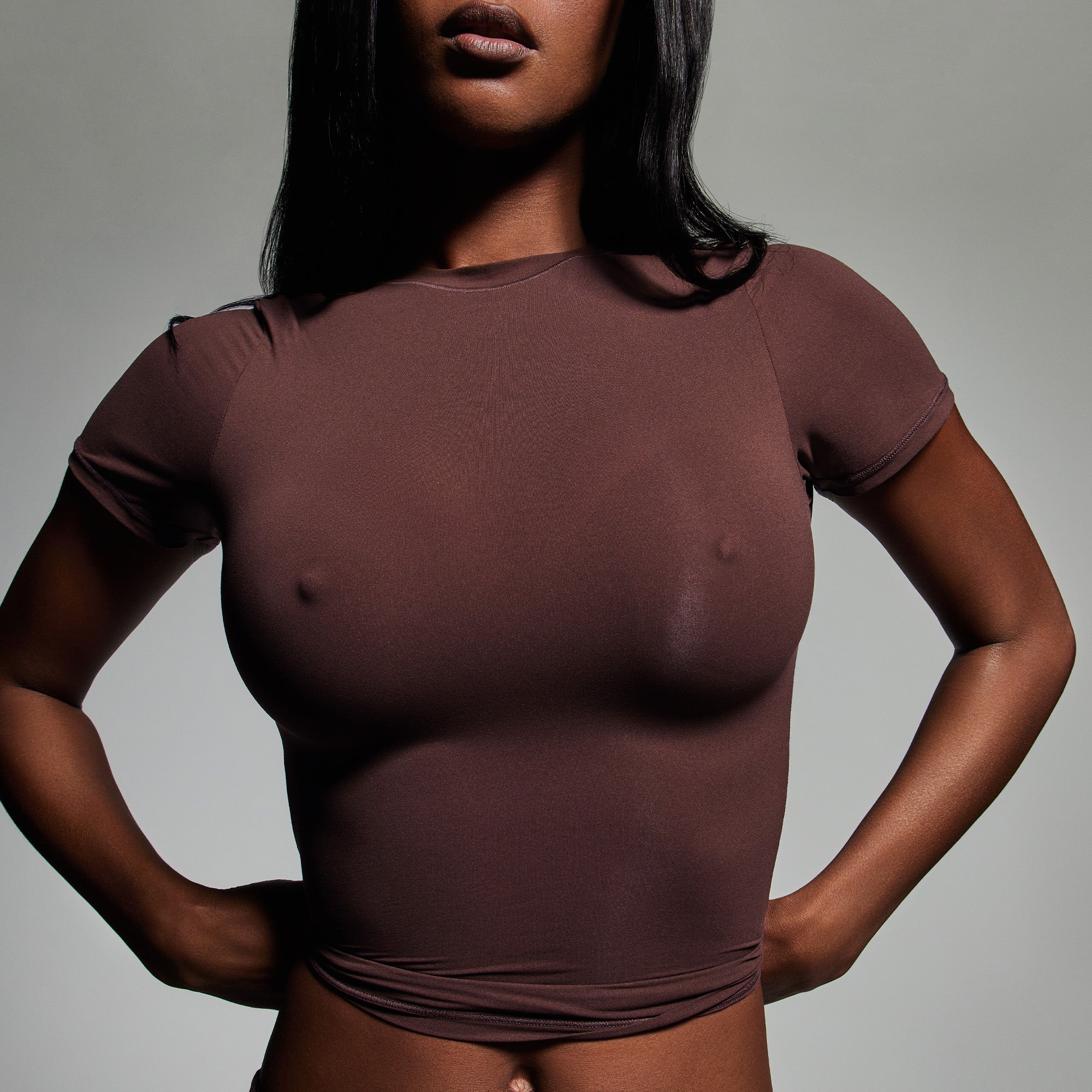 SKIMS ULTIMATE NIPPLE PUSH-UP BRA WORN BY A MODEL IN CAMPAIGN IMAGERY | FOCUS: 0.9, 0.1, 0.7