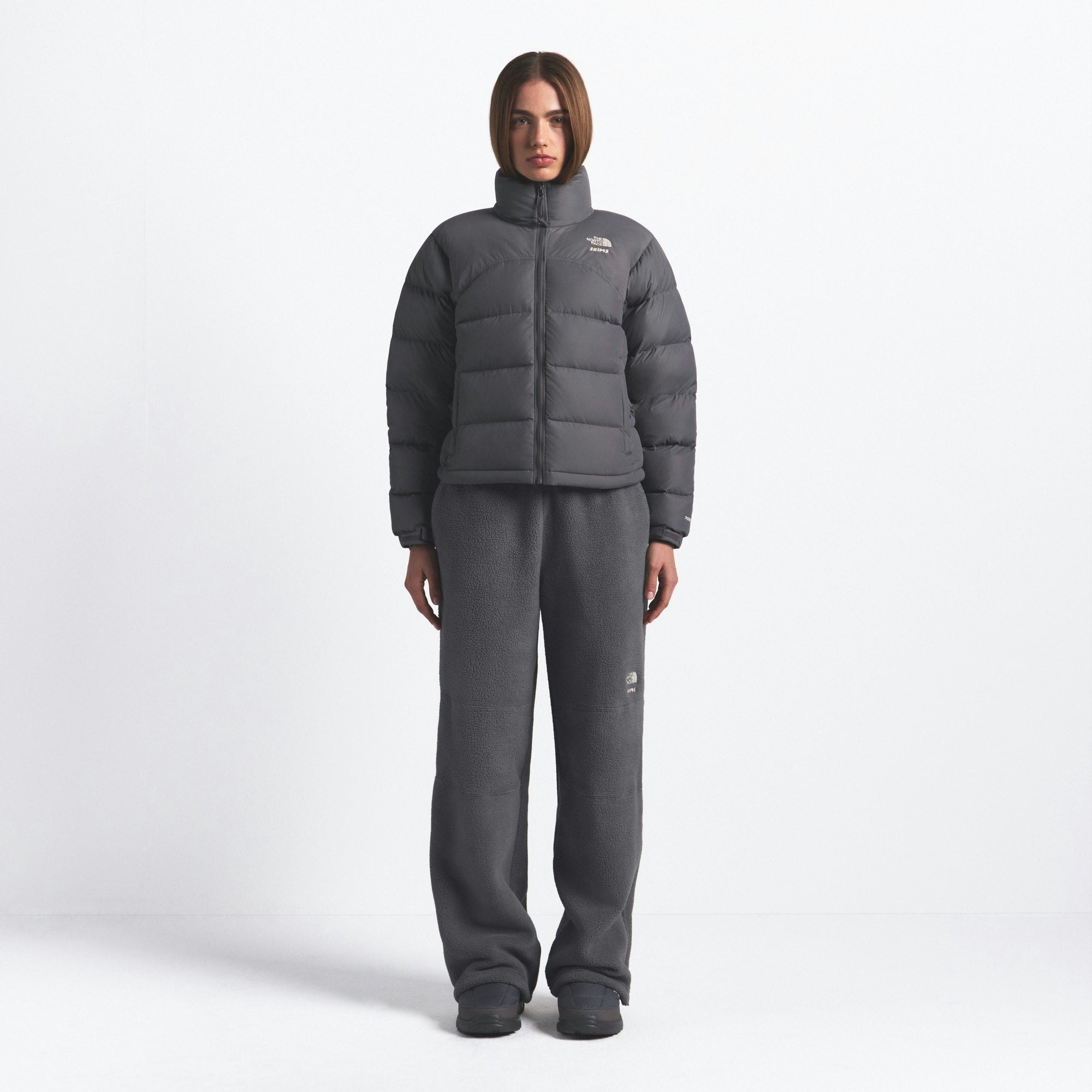 THE NORTH FACE X SKIMS 2000 RETRO NUPTSE JACKET | GUNMETAL ON A MODEL FRONT VIEW @ | FOCUS: 0.0, 1.0, 0.9
