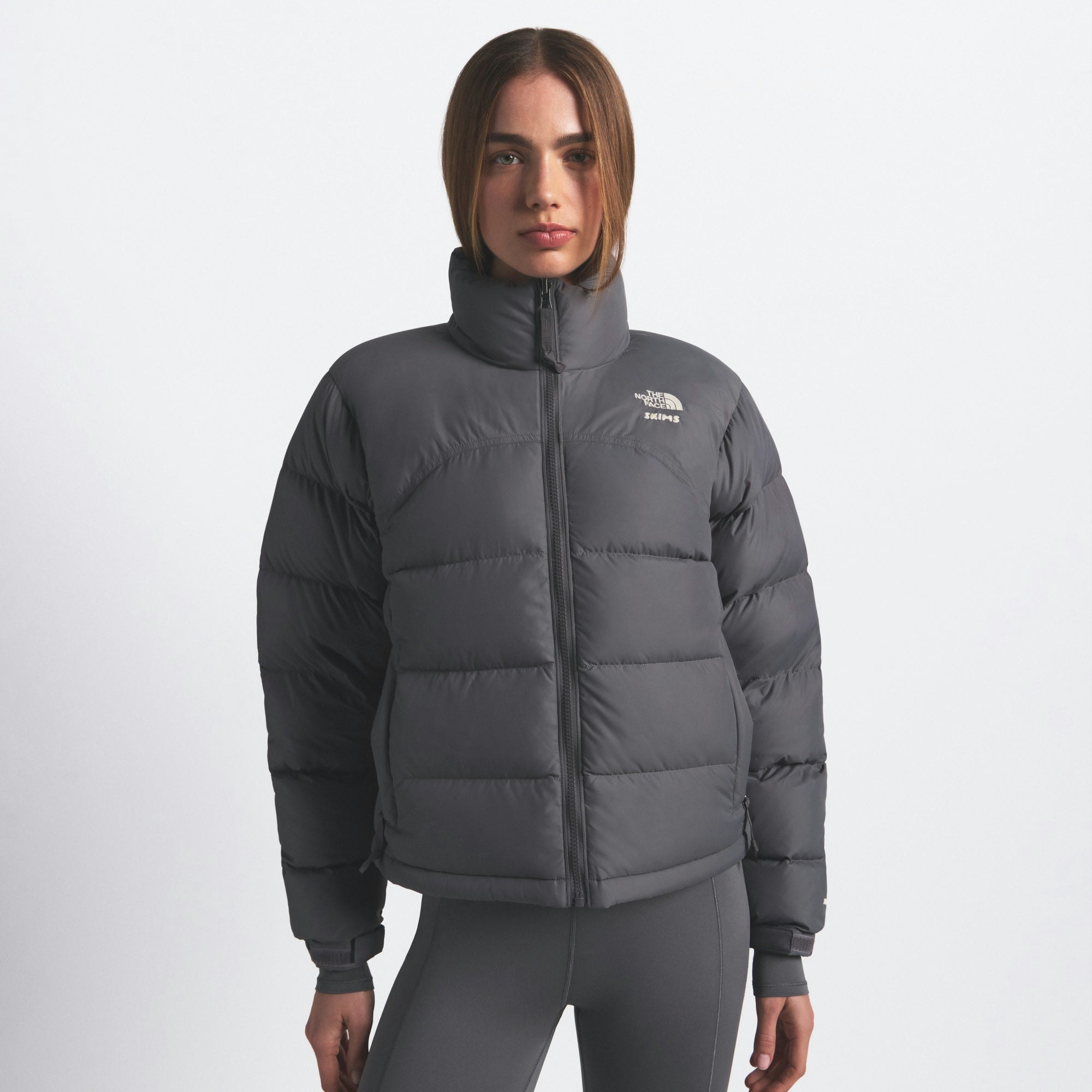 THE NORTH FACE X SKIMS 2000 RETRO NUPTSE JACKET | GUNMETAL ON A MODEL FRONT VIEW @ | FOCUS: 0.0, 1.0, 0.9