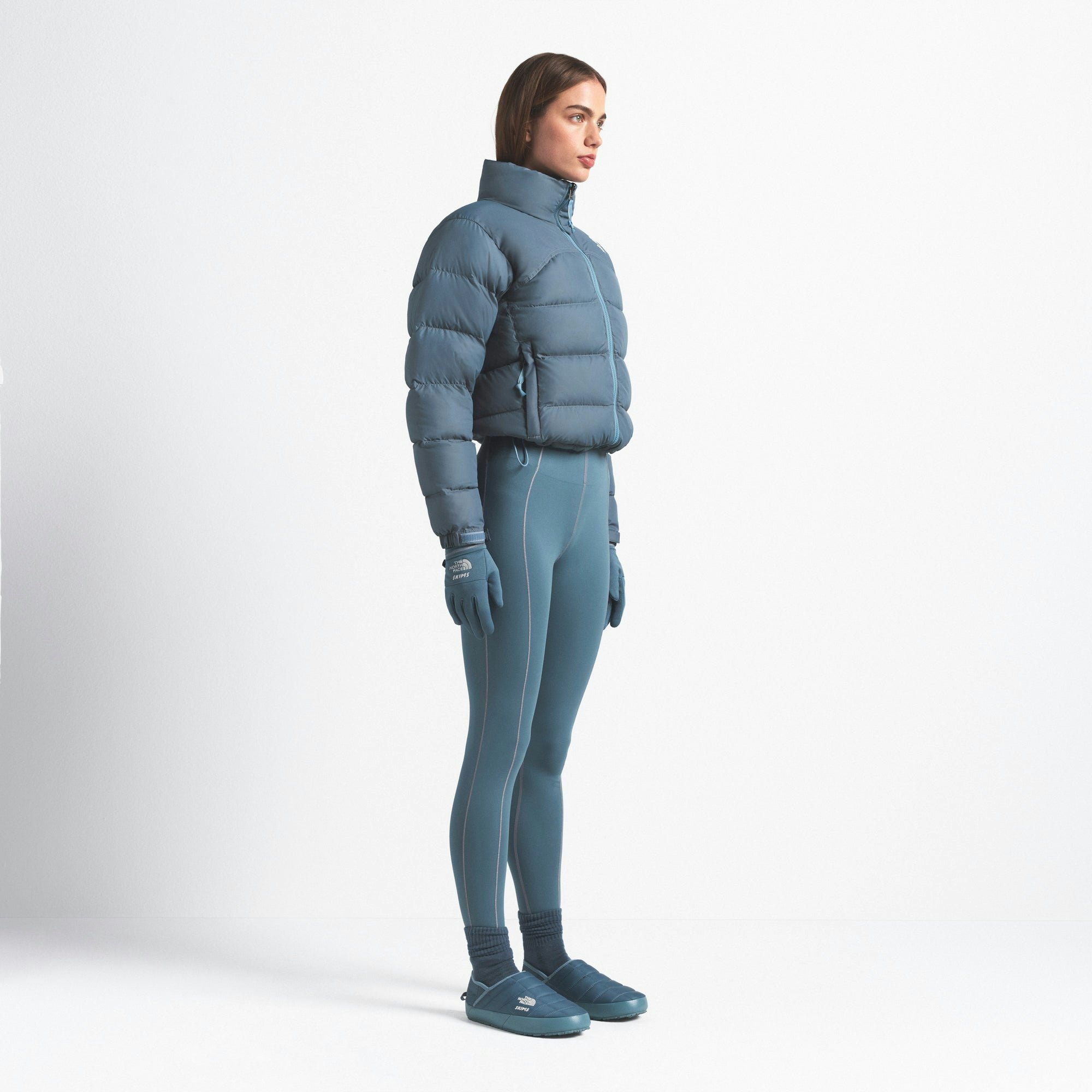 THE NORTH FACE X SKIMS 2000 RETRO NUPTSE JACKET | KYANITE ON A MODEL FRONT VIEW @ | FOCUS: 0.0, 1.0, 0.9