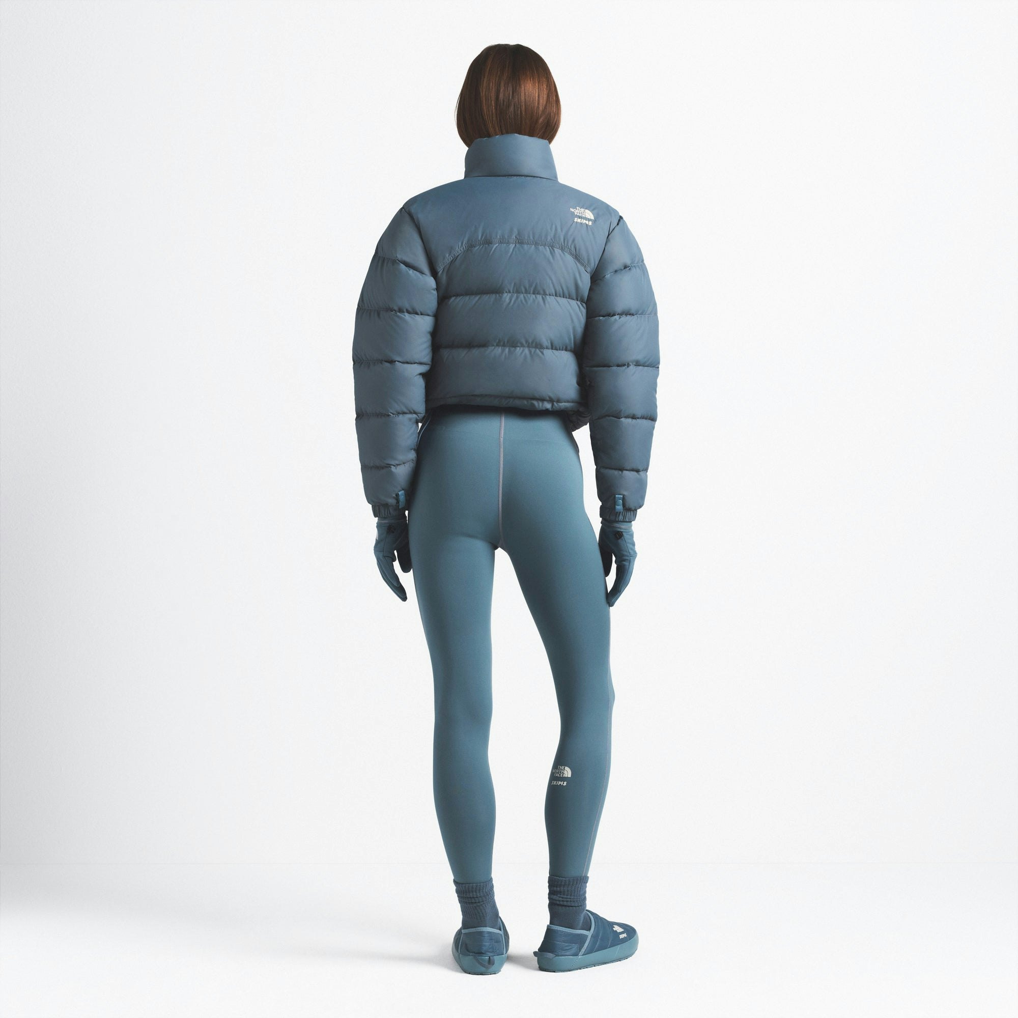 THE NORTH FACE X SKIMS 2000 RETRO NUPTSE JACKET | KYANITE ON A MODEL FRONT VIEW @ | FOCUS: 0.0, 1.0, 0.9