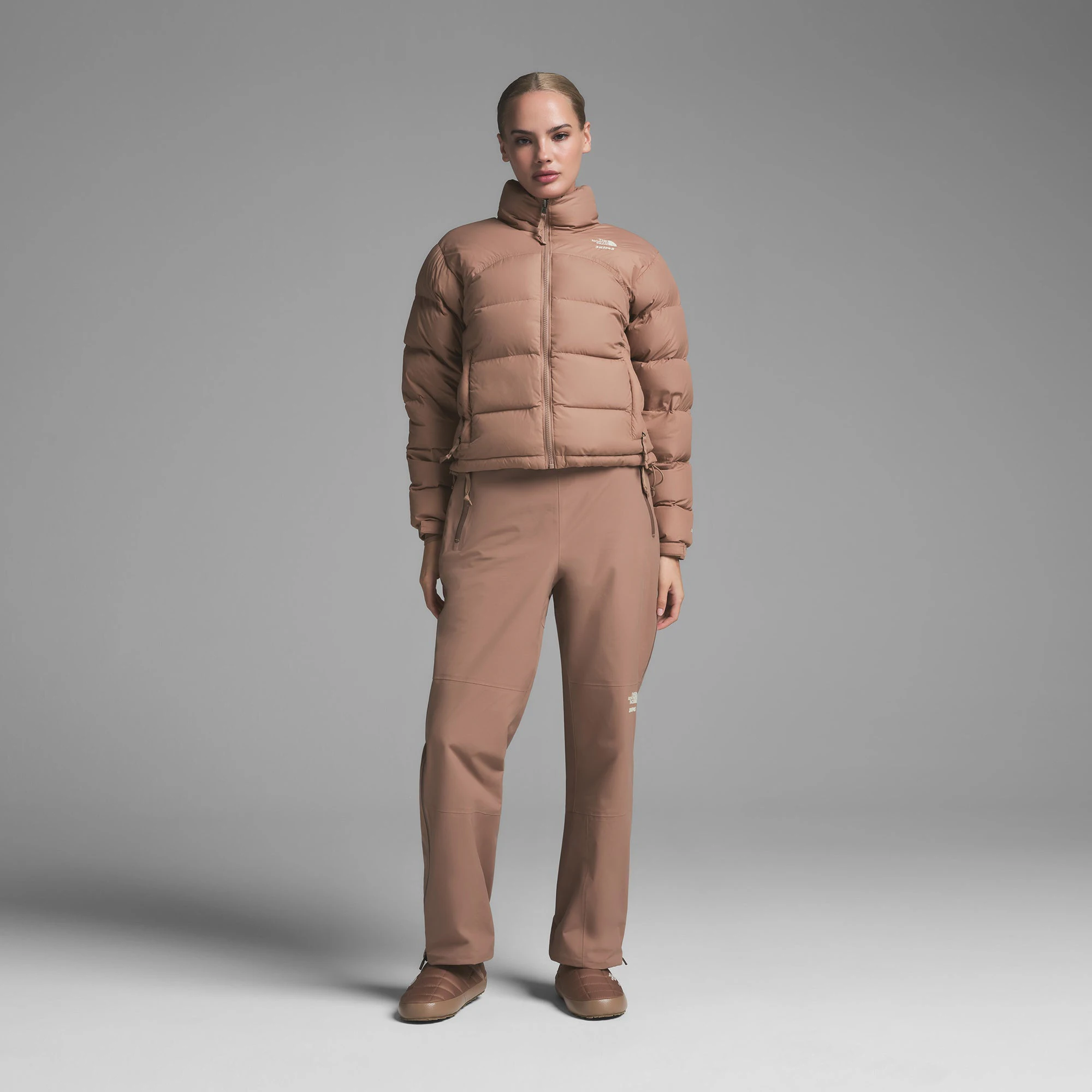 THE NORTH FACE X SKIMS ON A MODEL FRONT VIEW000 RETRO NUPTSE JACKET | SIENNA ON A MODEL FRONT VIEW