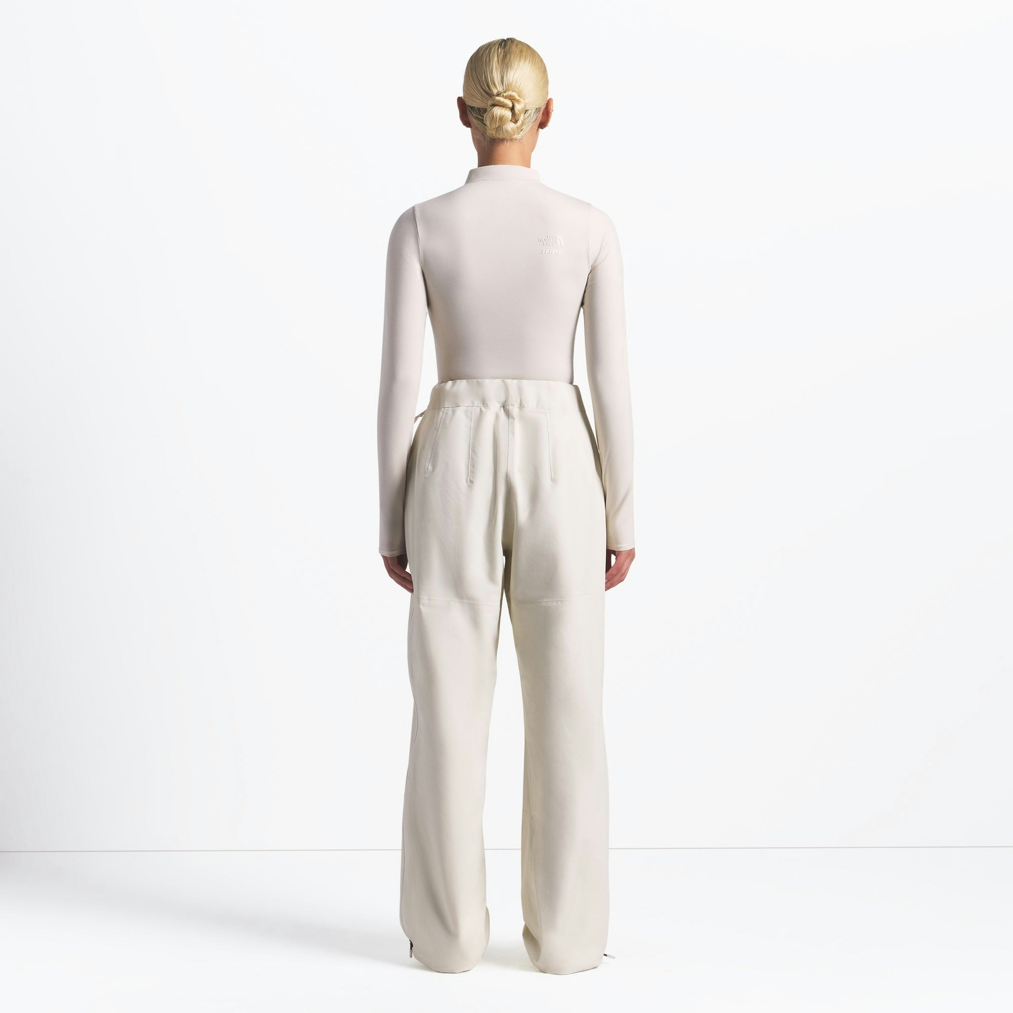 THE NORTH FACE X SKIMS SEAM TAPE PANT | BONE ON A MODEL FRONT VIEW @ | FOCUS: 0.0, 1.0, 0.9