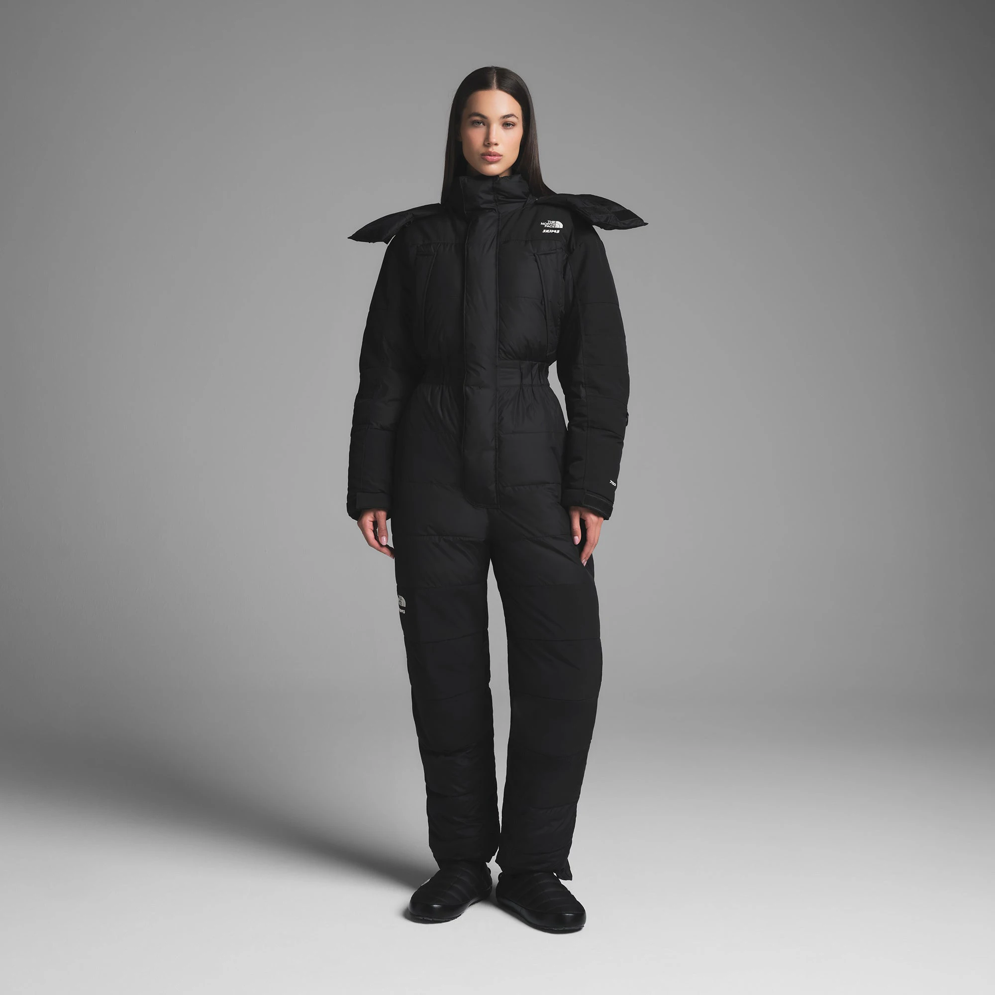 THE NORTH FACE X SKIMS DOWN ONE PIECE | ONYX ON A MODEL FRONT VIEW | FOCUS: 0.0, 1.0, 0.9