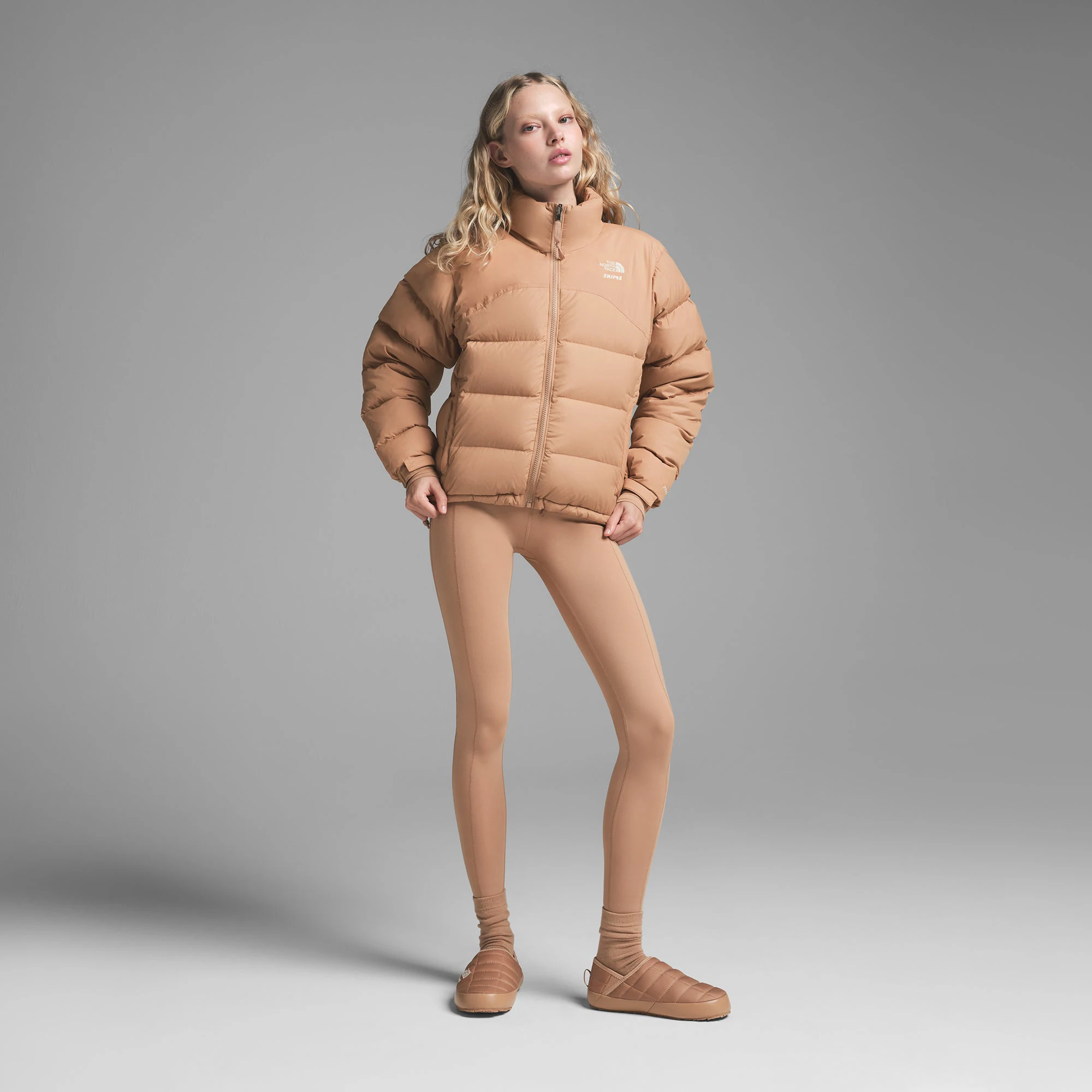 THE NORTH FACE X SKIMS THERMOBALL TRACTION MULES V | OCHRE ON A MODEL FRONT VIEW | FOCUS: 0.0, 1.0, 0.9