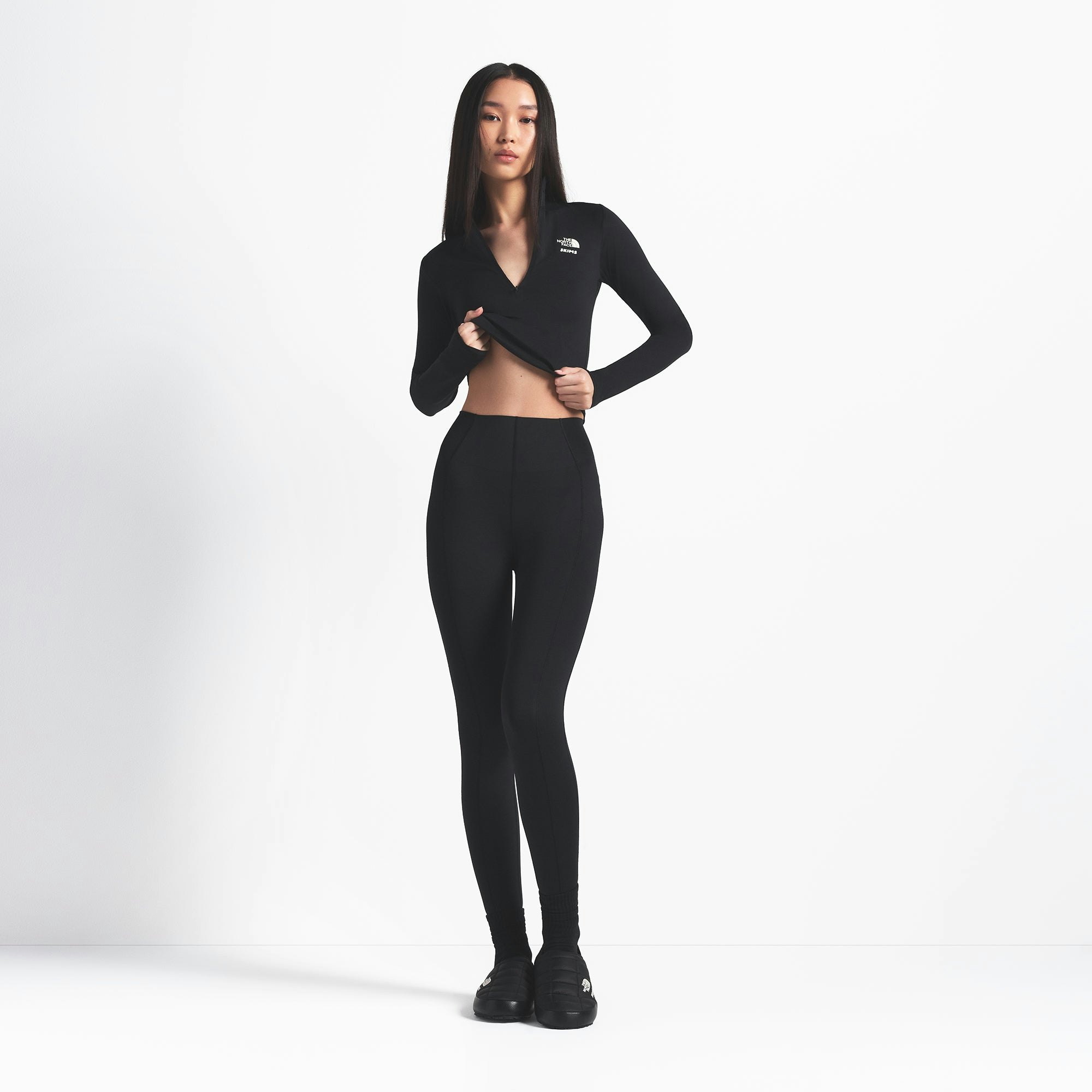 THE NORTH FACE X SKIMS REFINA LEGGING | ONYX ON A MODEL FRONT VIEW @ | FOCUS: 0.0, 1.0, 0.9
