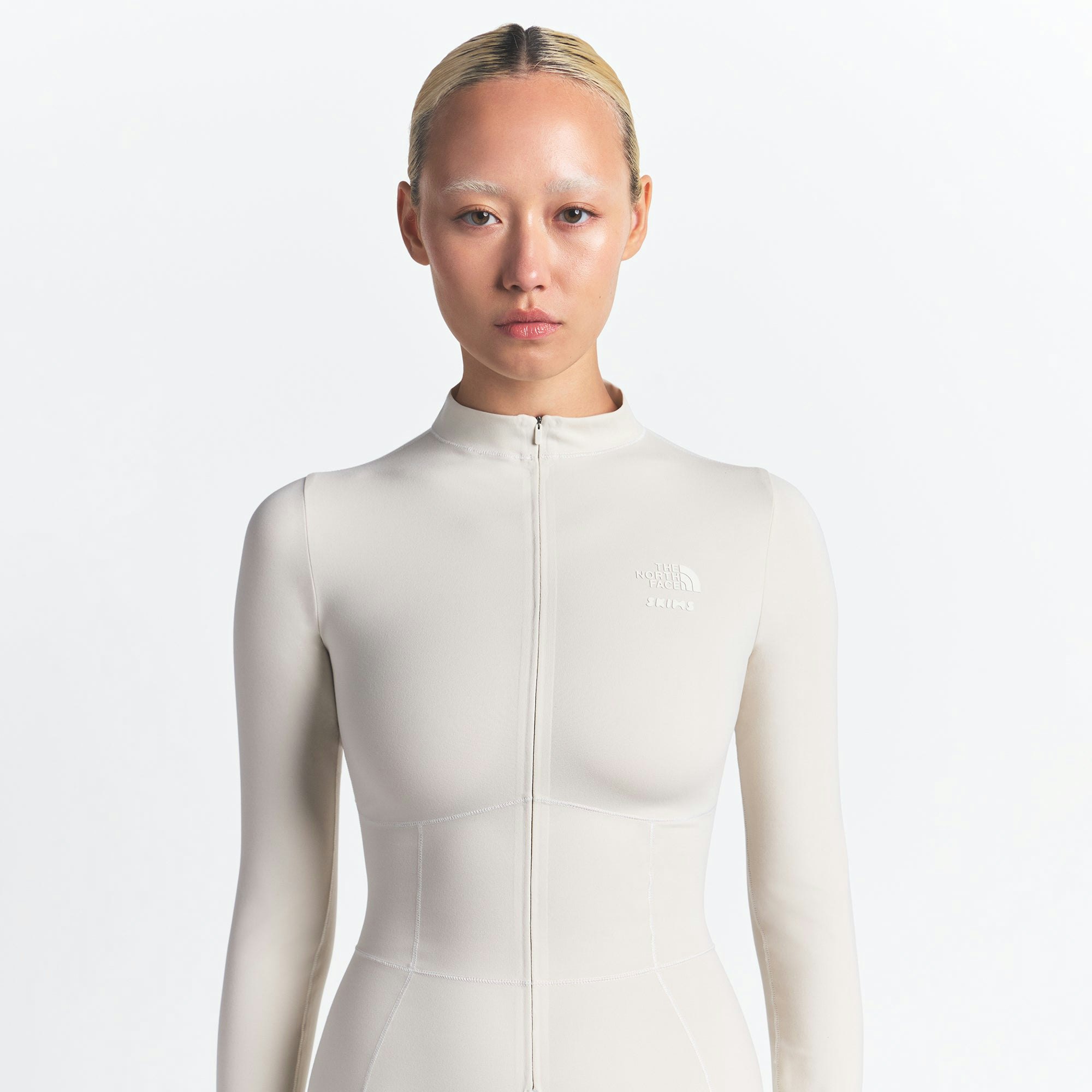 THE NORTH FACE X SKIMS REFINA BODYSUIT | BONE ON A MODEL FRONT VIEW @ | FOCUS: 0.0, 1.0, 0.9