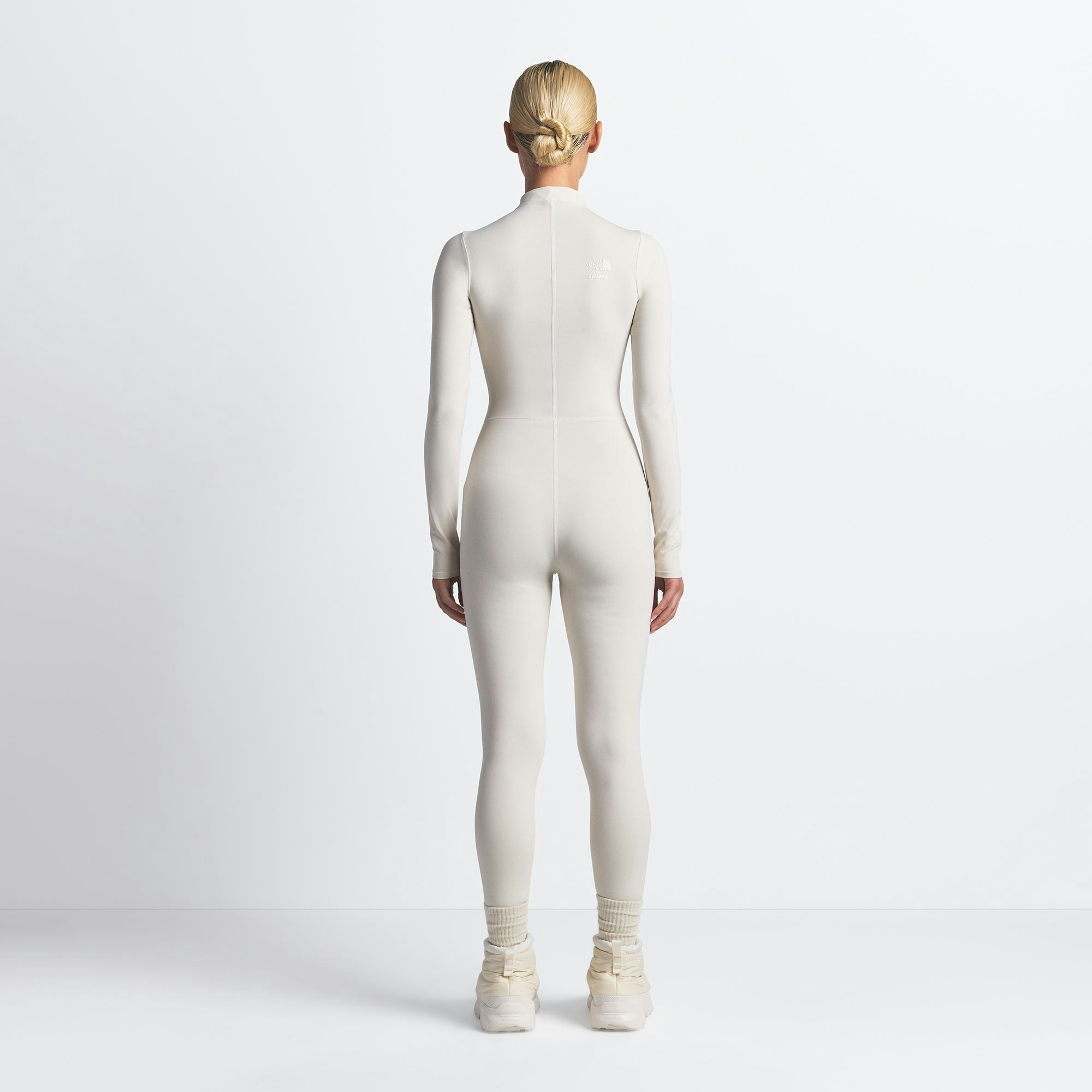 THE NORTH FACE X SKIMS REFINA BODYSUIT | BONE ON A MODEL FRONT VIEW @ | FOCUS: 0.0, 1.0, 0.9