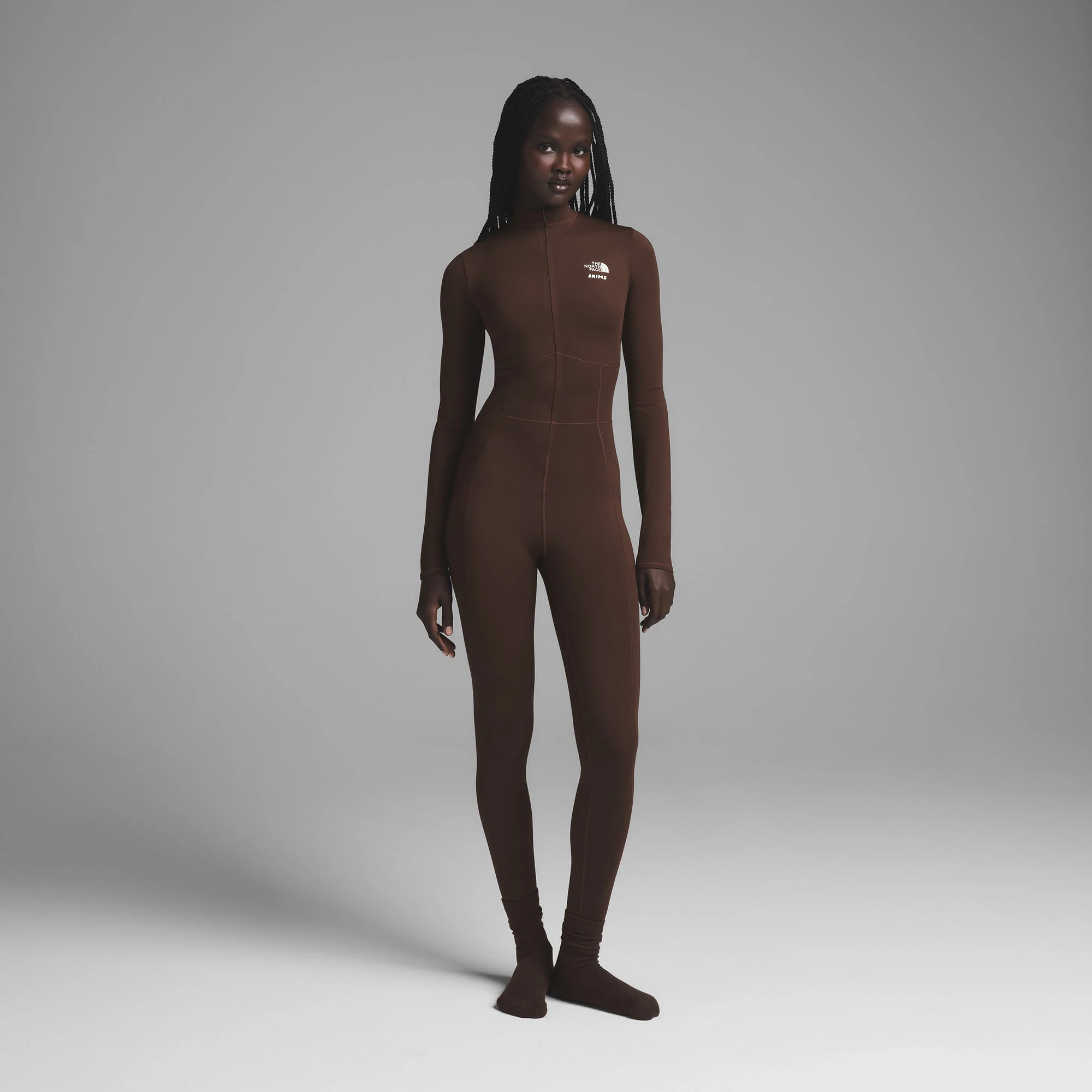 THE NORTH FACE X SKIMS REFINA BODYSUIT | COCOA ON A MODEL FRONT VIEW | FOCUS: 0.0, 1.0, 0.9