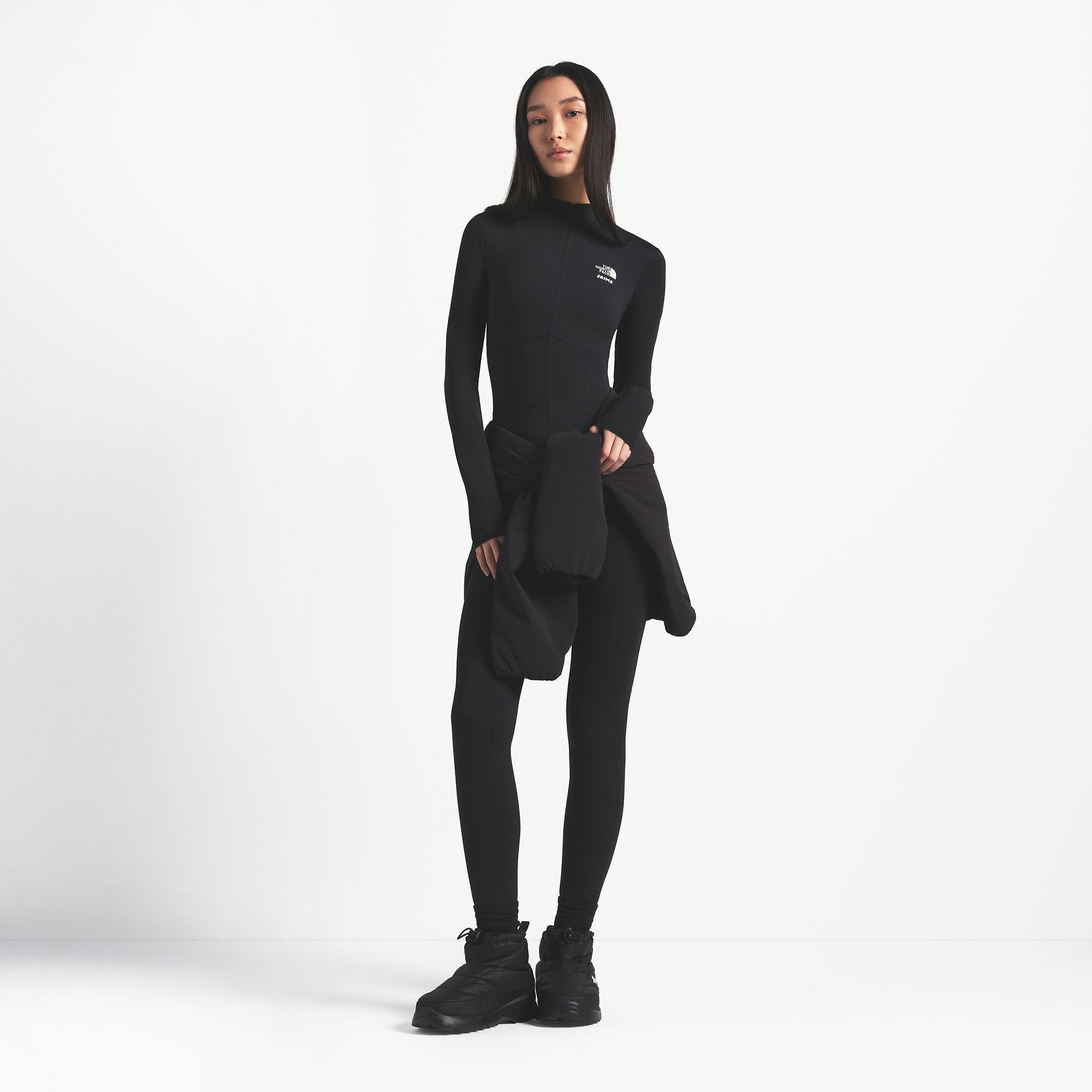 THE NORTH FACE X SKIMS REFINA BODYSUIT | ONYX ON A MODEL FRONT VIEW @ | FOCUS: 0.0, 1.0, 0.9
