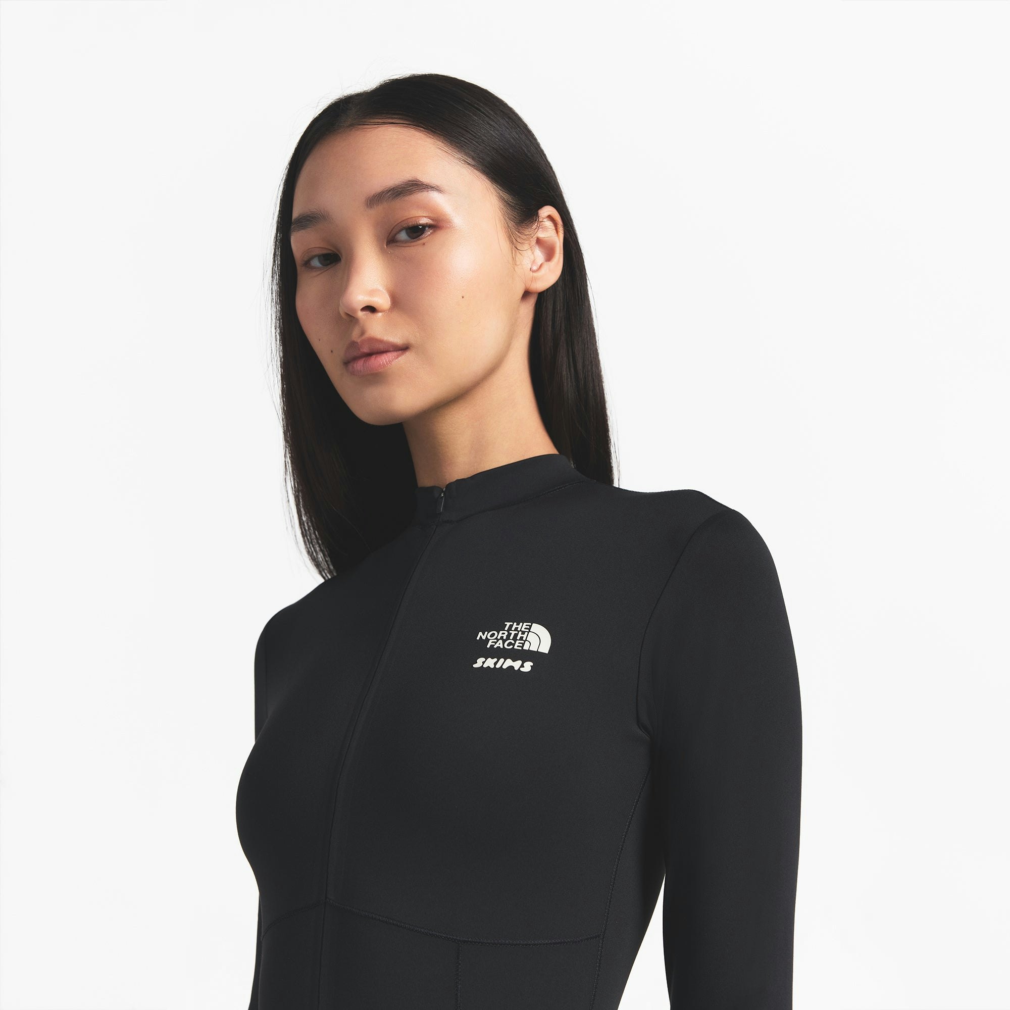 THE NORTH FACE X SKIMS REFINA BODYSUIT | ONYX ON A MODEL FRONT VIEW @ | FOCUS: 0.0, 1.0, 0.9