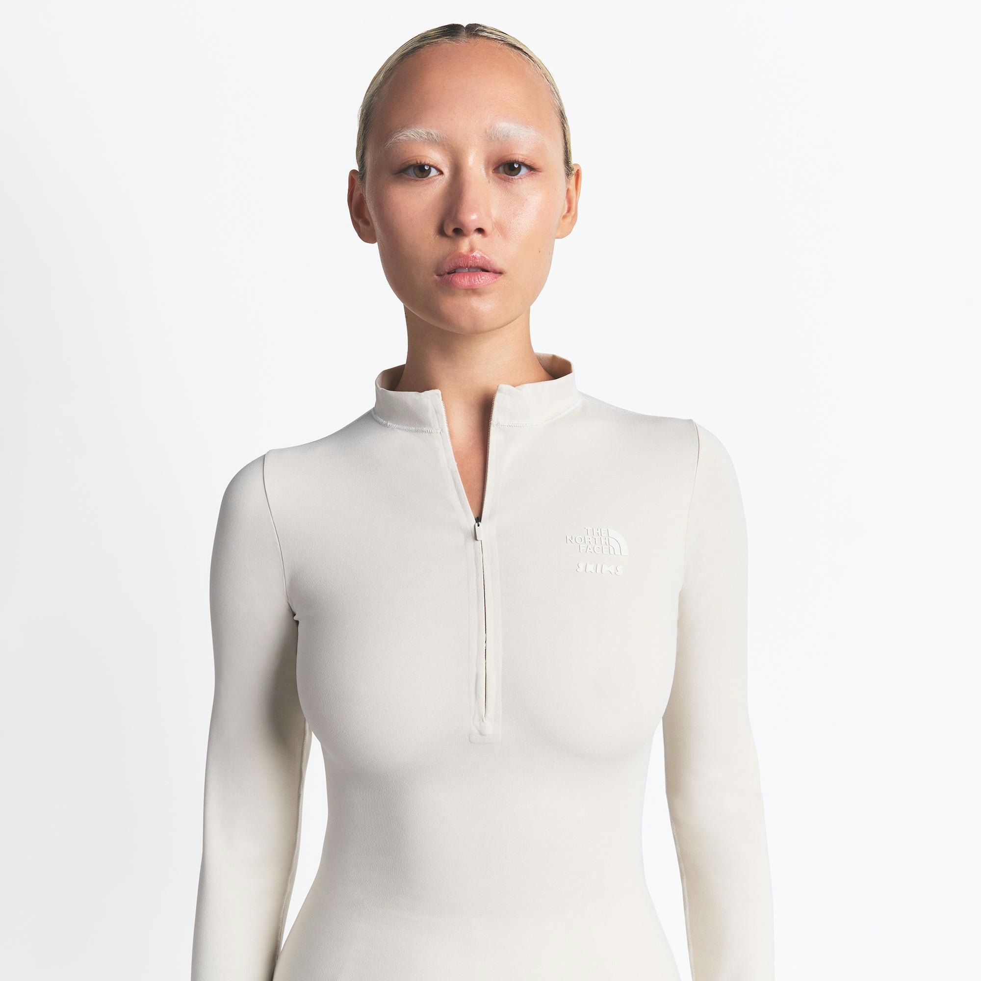 THE NORTH FACE X SKIMS REFINA LONG SLEEVE TOP | BONE ON A MODEL FRONT VIEW @ | FOCUS: 0.0, 1.0, 0.9