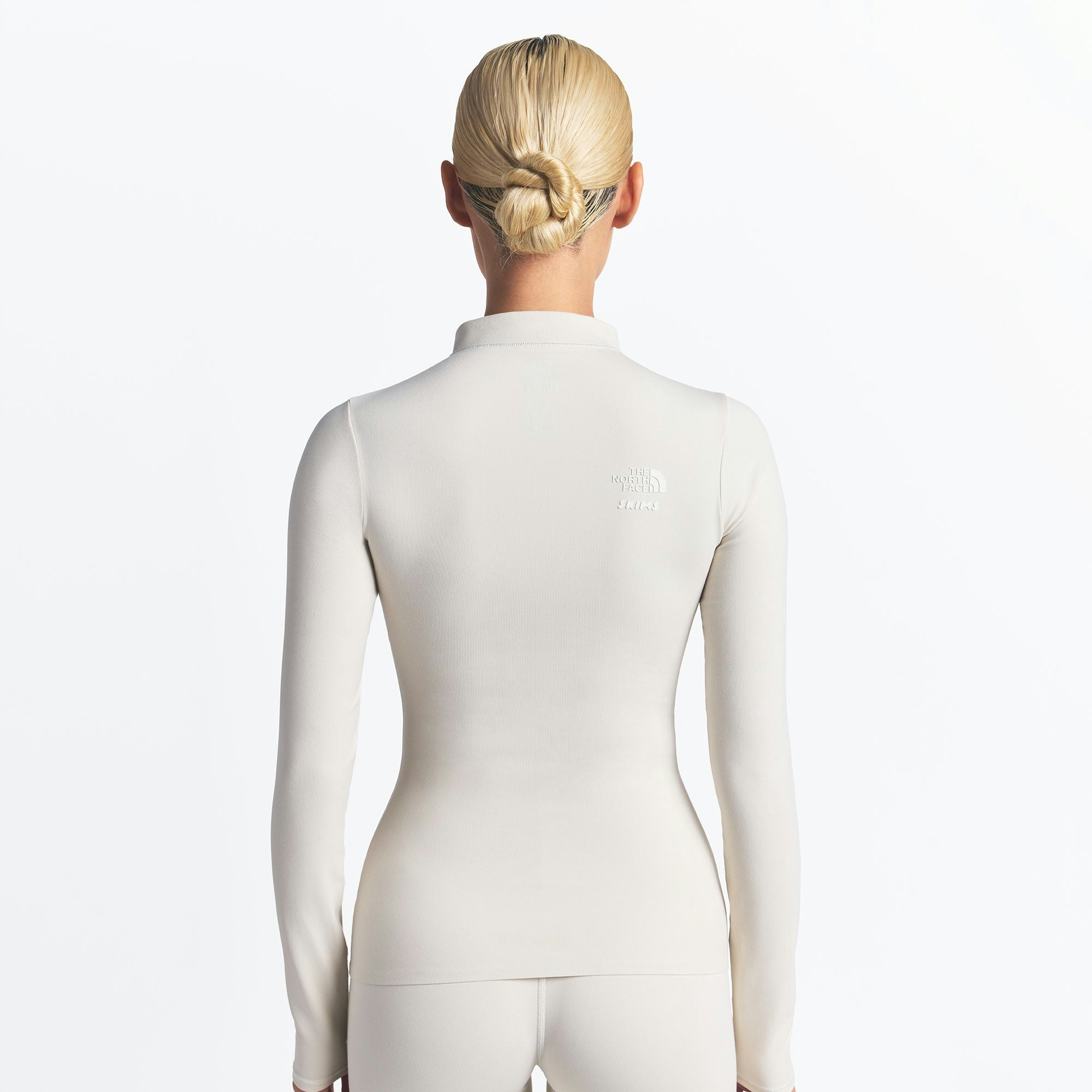 THE NORTH FACE X SKIMS REFINA LONG SLEEVE TOP | BONE ON A MODEL FRONT VIEW @ | FOCUS: 0.0, 1.0, 0.9