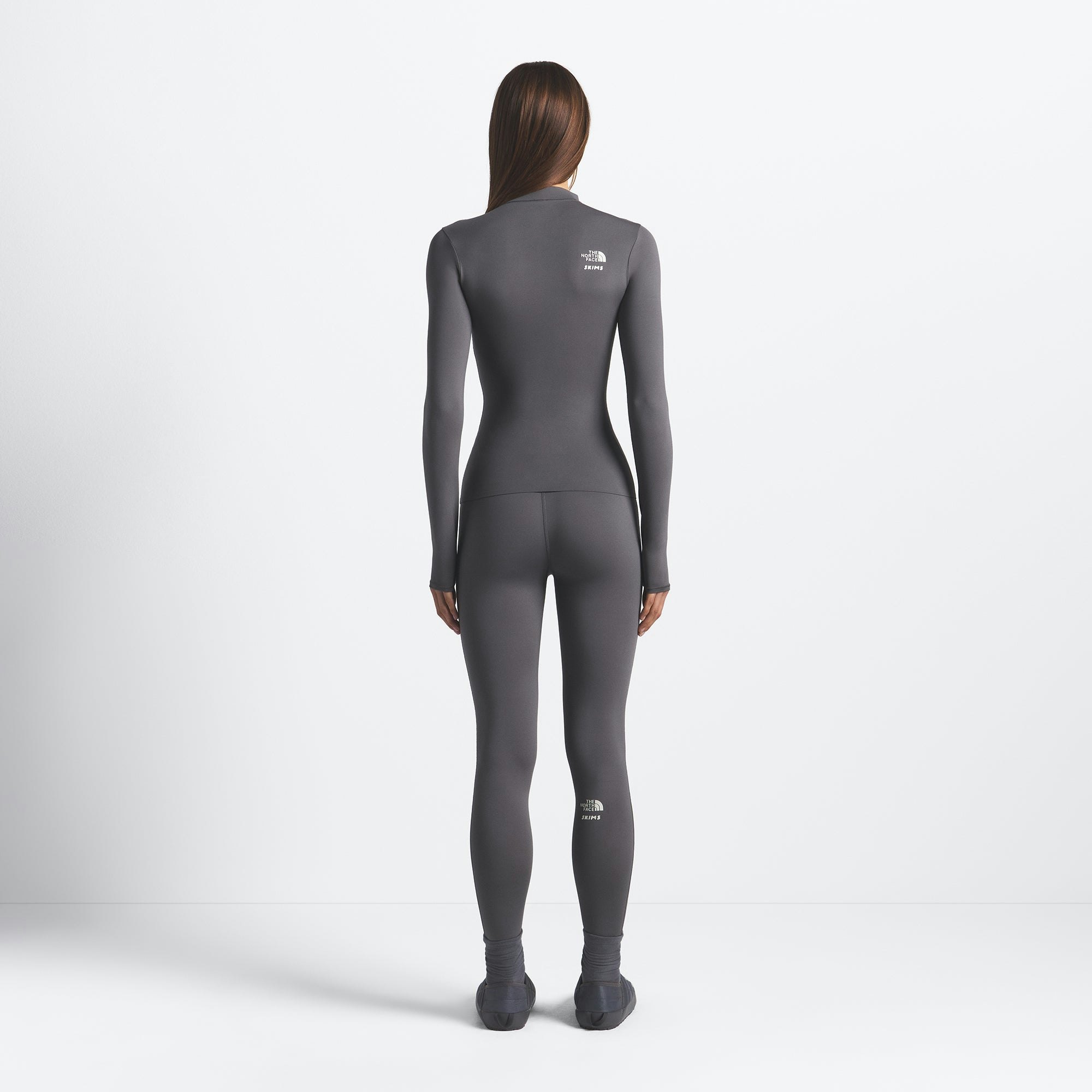 THE NORTH FACE X SKIMS REFINA LONG SLEEVE TOP | GUNMETAL ON A MODEL FRONT VIEW @ | FOCUS: 0.0, 1.0, 0.9