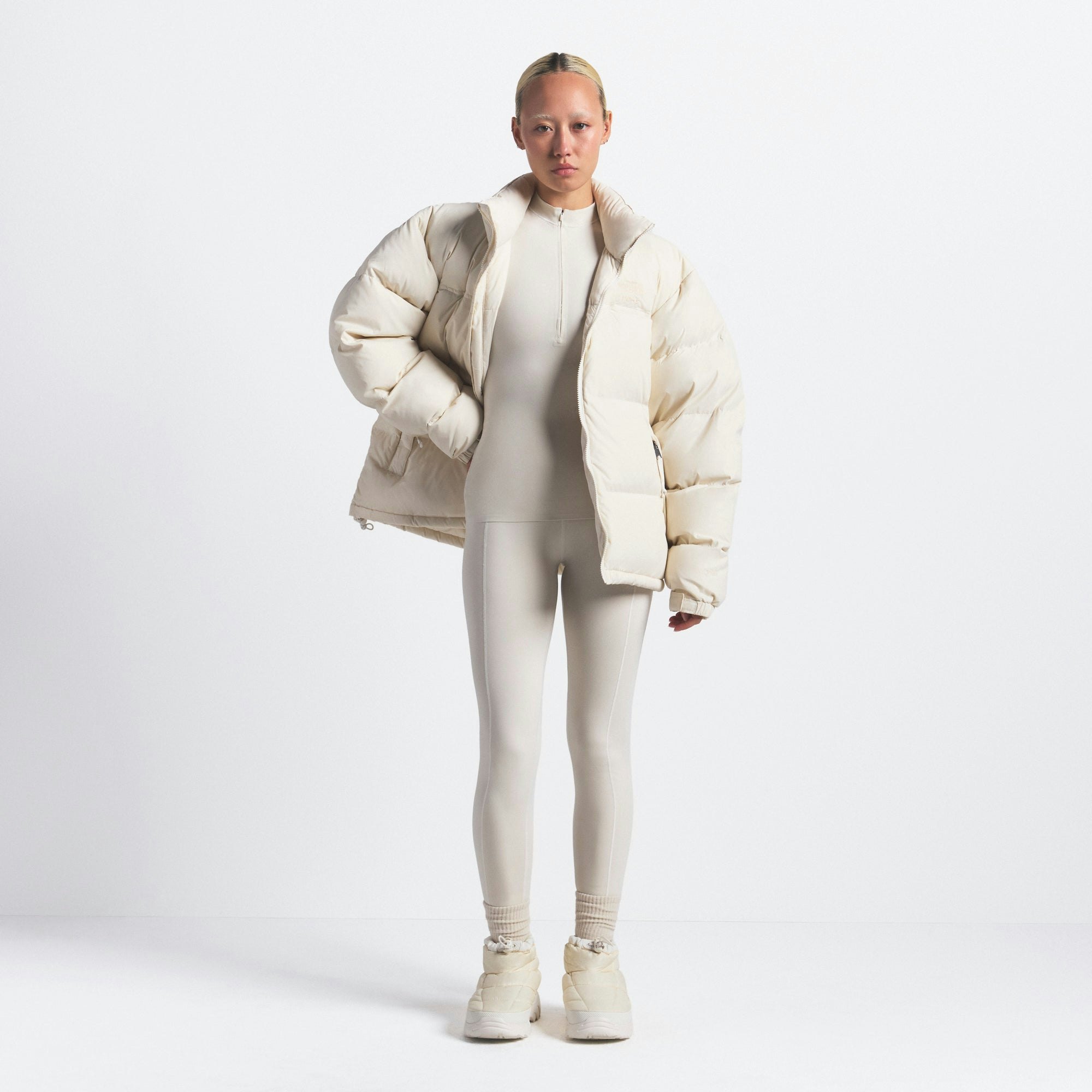 THE NORTH FACE X SKIMS 1996 NUPTSE JACKET | BONE ON A MODEL FRONT VIEW @ | FOCUS: 0.0, 1.0, 0.9