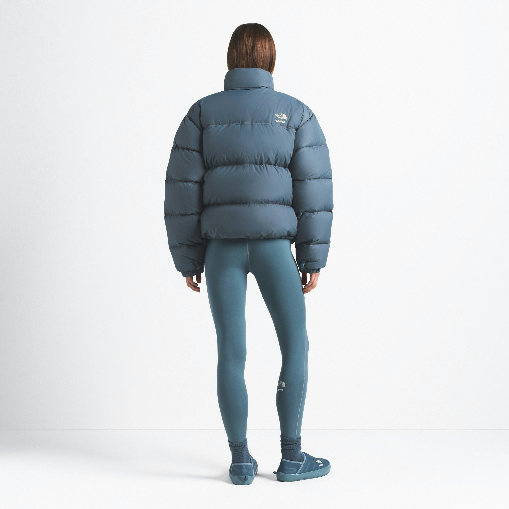 THE NORTH FACE X SKIMS 1996 NUPTSE JACKET | KYANITE ON A MODEL FRONT VIEW @ | FOCUS: 0.0, 1.0, 0.9
