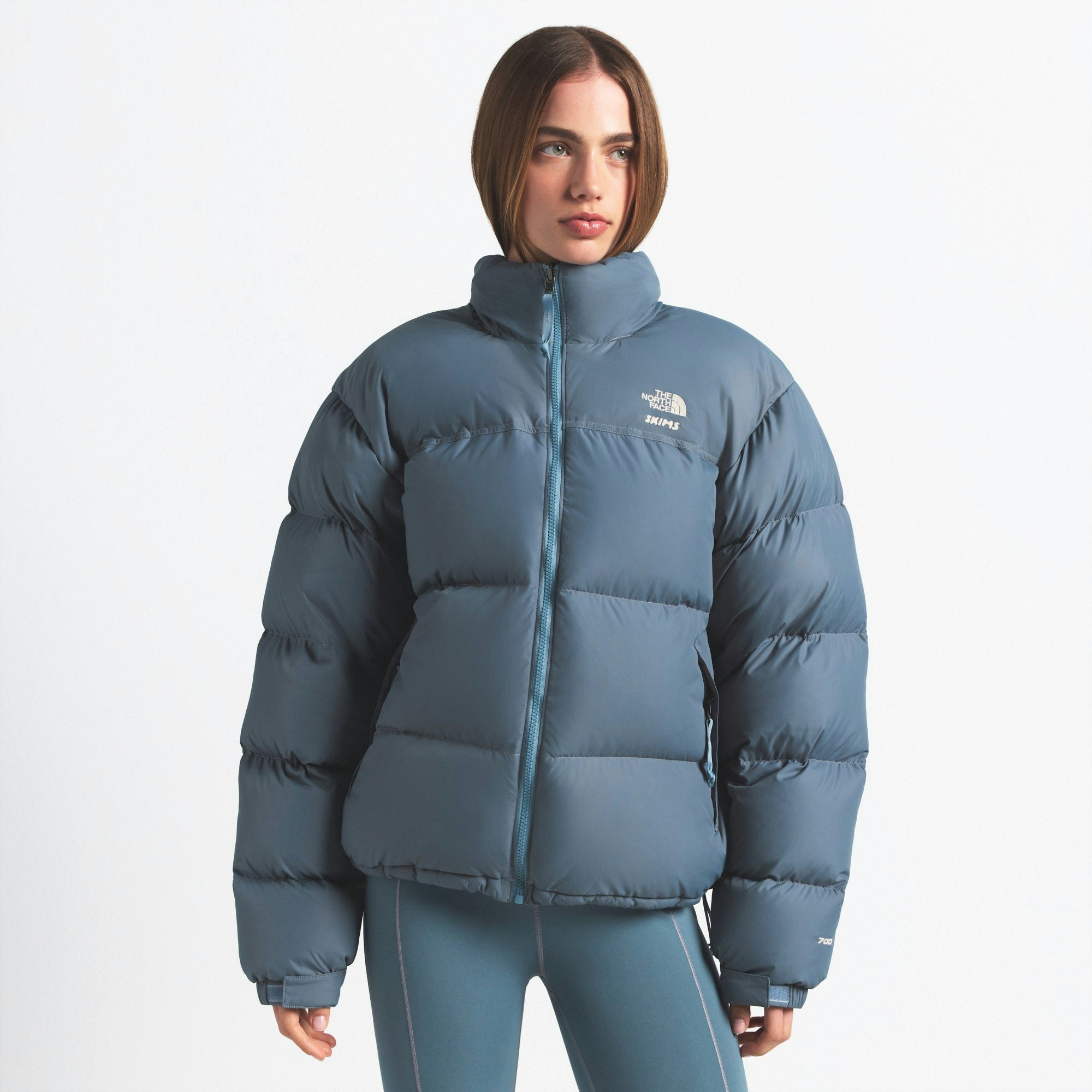 THE NORTH FACE X SKIMS 1996 NUPTSE JACKET | KYANITE ON A MODEL FRONT VIEW @ | FOCUS: 0.0, 1.0, 0.9