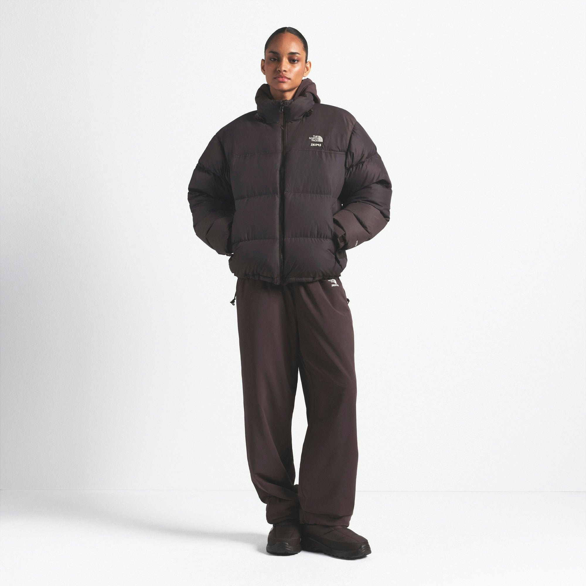 THE NORTH FACE X SKIMS 1996 NUPTSE JACKET | PHOENIX ON A MODEL FRONT VIEW @ | FOCUS: 0.0, 1.0, 0.9