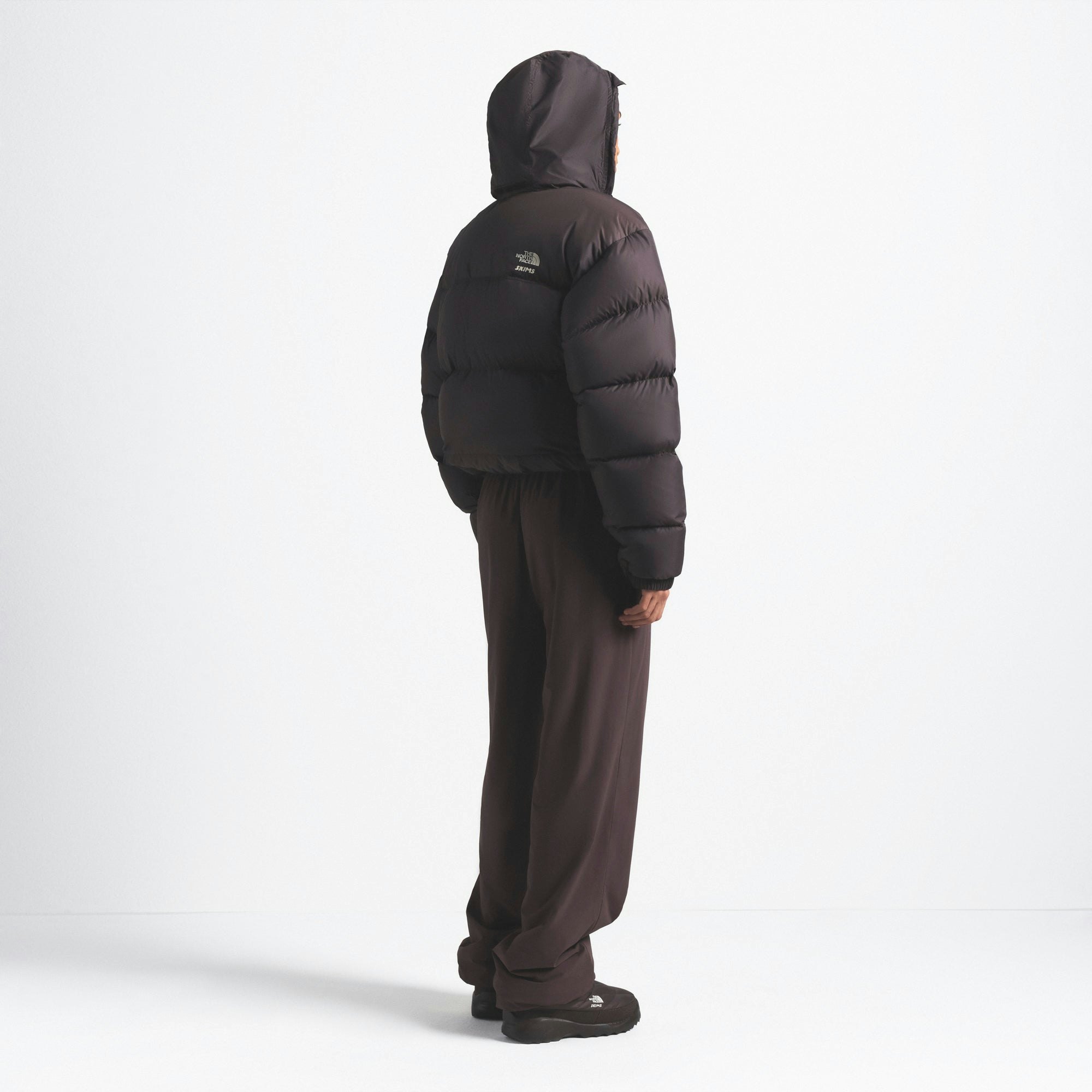 THE NORTH FACE X SKIMS 1996 NUPTSE JACKET | PHOENIX ON A MODEL FRONT VIEW @ | FOCUS: 0.0, 1.0, 0.9