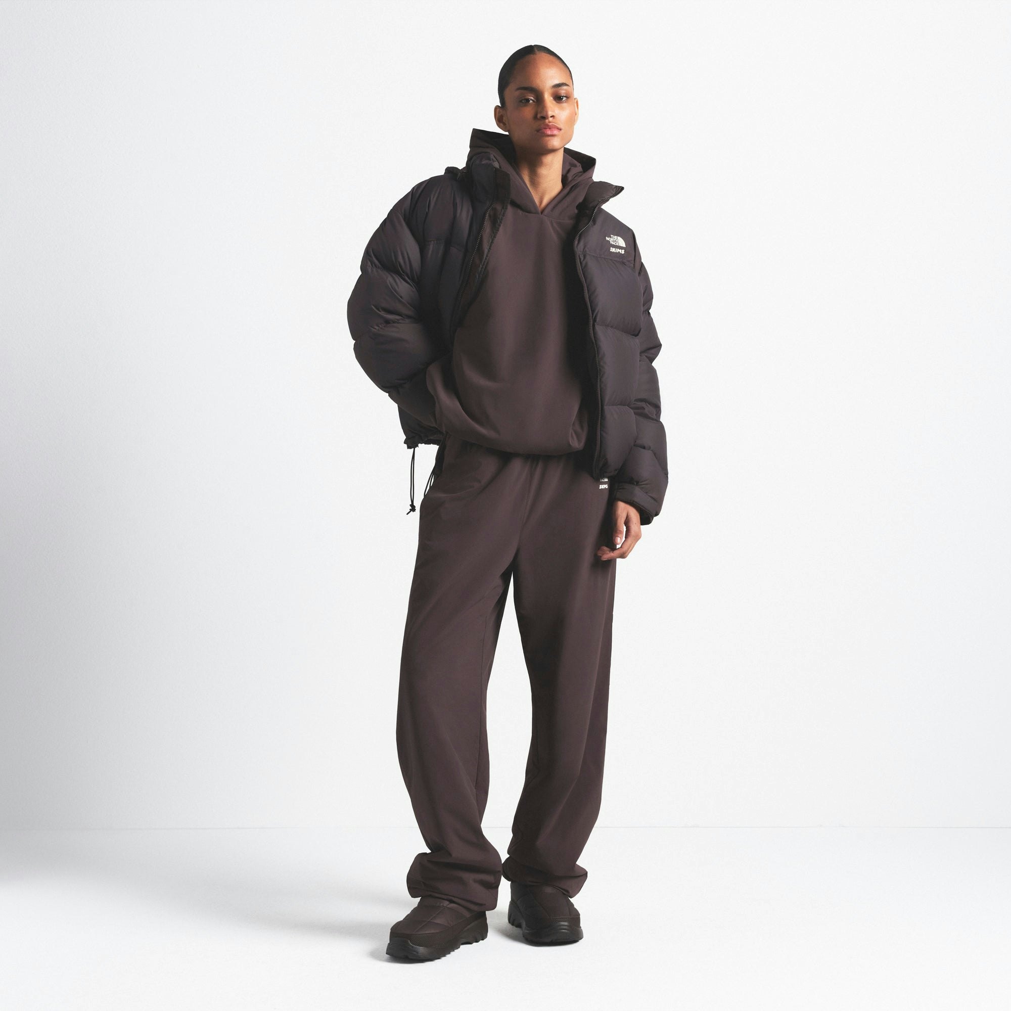 THE NORTH FACE X SKIMS 1996 NUPTSE JACKET | PHOENIX ON A MODEL FRONT VIEW @ | FOCUS: 0.0, 1.0, 0.9