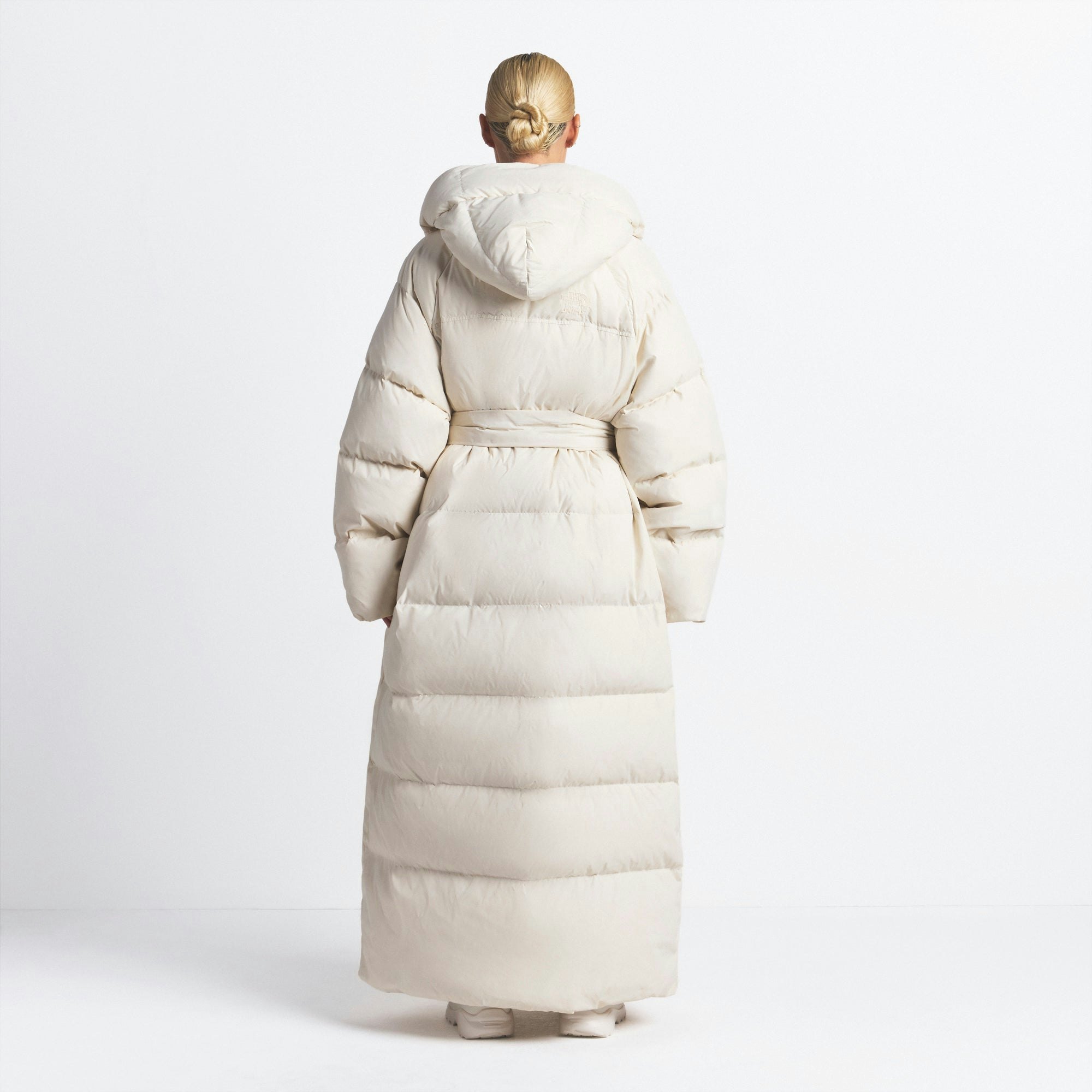 THE NORTH FACE X SKIMS NUPTSE WRAP PARKA | BONE ON A MODEL FRONT VIEW @ | FOCUS: 0.0, 1.0, 0.9