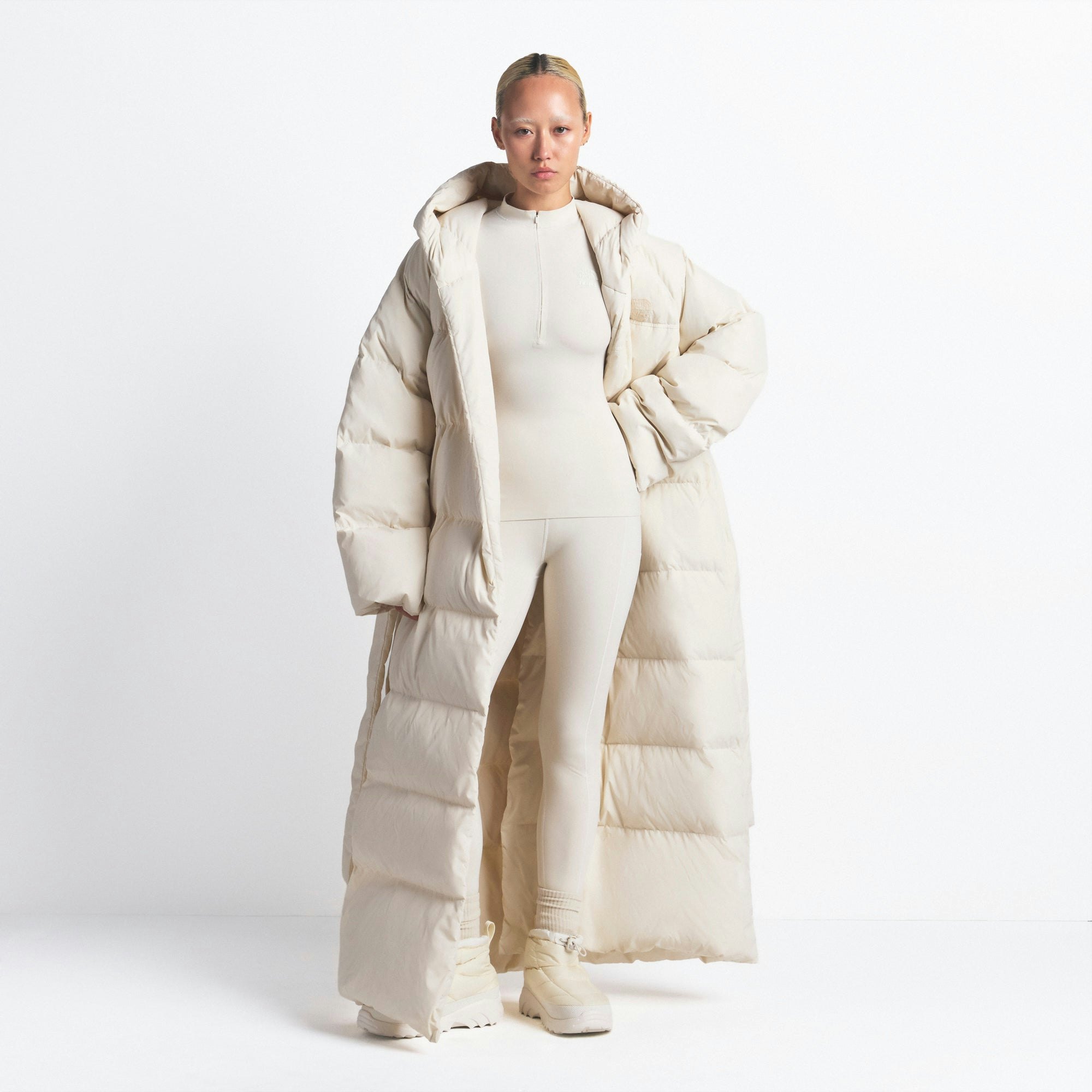 THE NORTH FACE X SKIMS NUPTSE WRAP PARKA | BONE ON A MODEL FRONT VIEW @ | FOCUS: 0.0, 1.0, 0.9