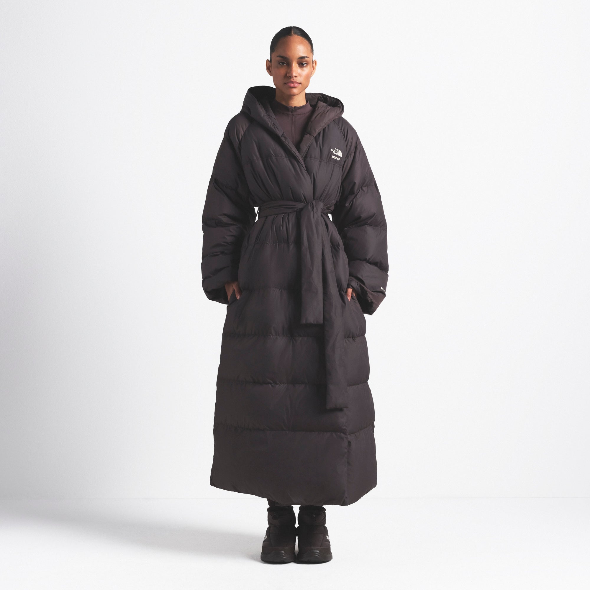THE NORTH FACE X SKIMS NUPTSE WRAP PARKA | PHOENIX ON A MODEL FRONT VIEW @ | FOCUS: 0.0, 1.0, 0.9