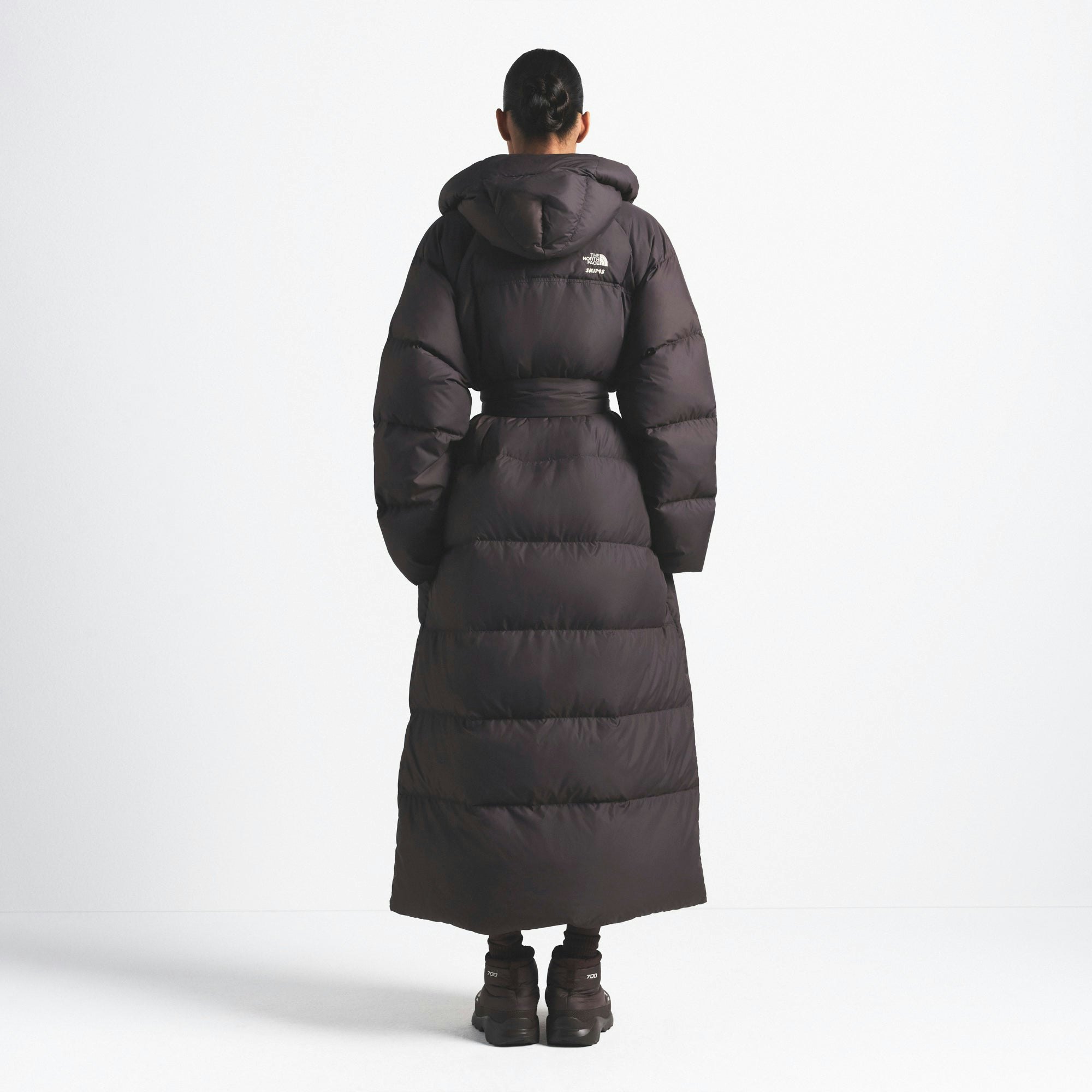THE NORTH FACE X SKIMS NUPTSE WRAP PARKA | PHOENIX ON A MODEL FRONT VIEW @ | FOCUS: 0.0, 1.0, 0.9