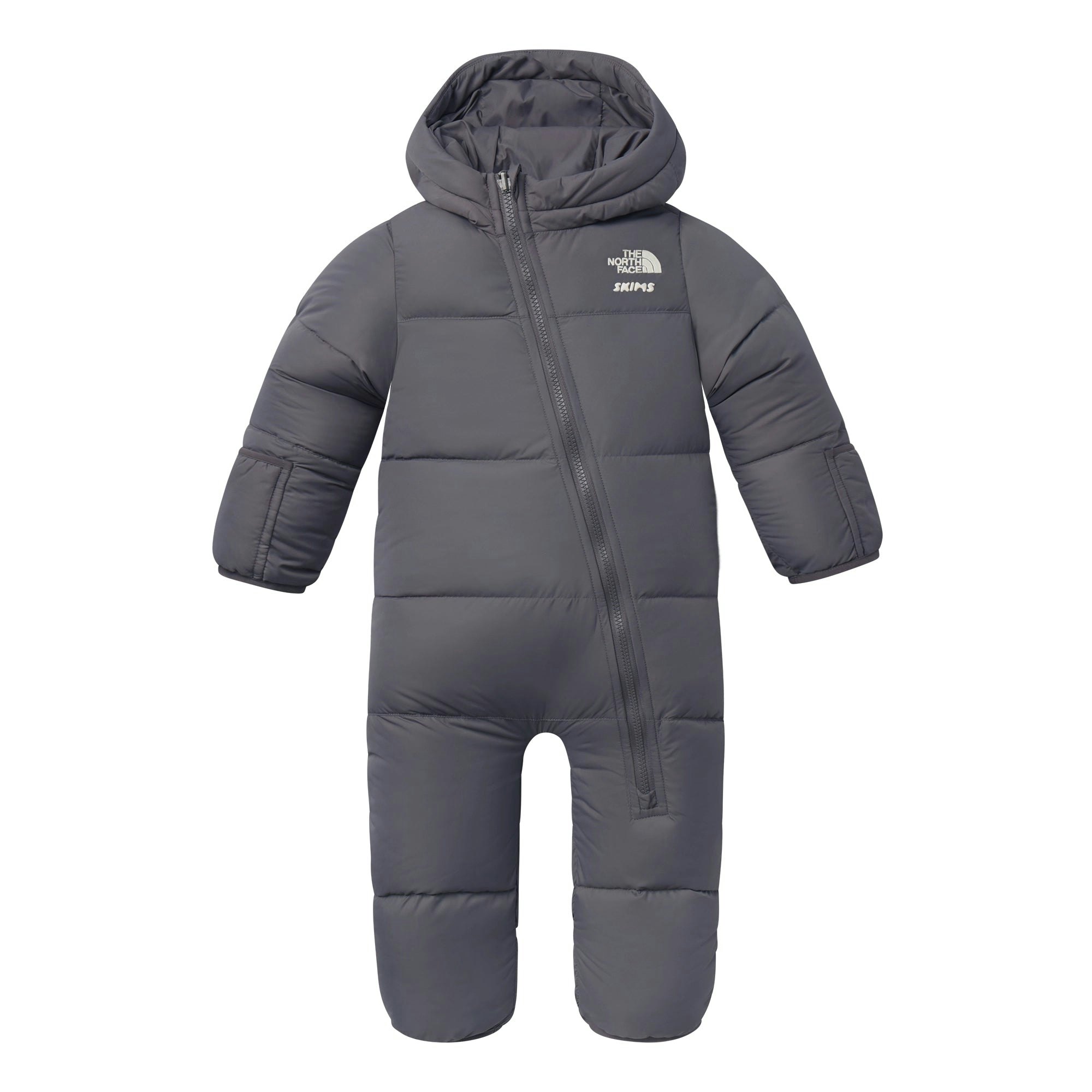 THE NORTH FACE X SKIMS BABY 1996 NUPTSE ONE-PIECE | GUNMETAL FLAT ON A WHITE BACKGROUND | FLT