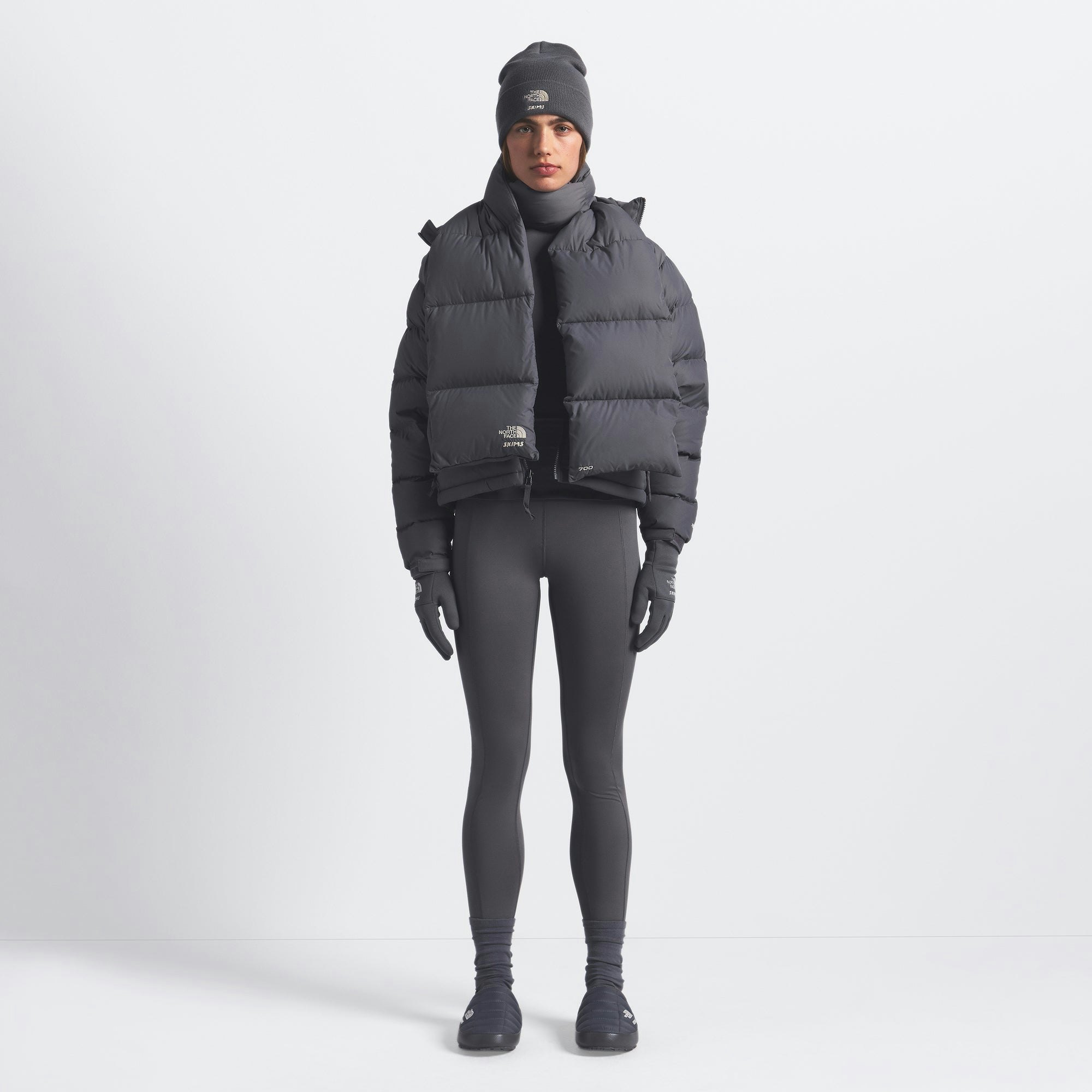 THE NORTH FACE X SKIMS NUPTSE SCARF | GUNMETAL ON A MODEL FRONT VIEW @ | FOCUS: 0.0, 1.0, 0.9