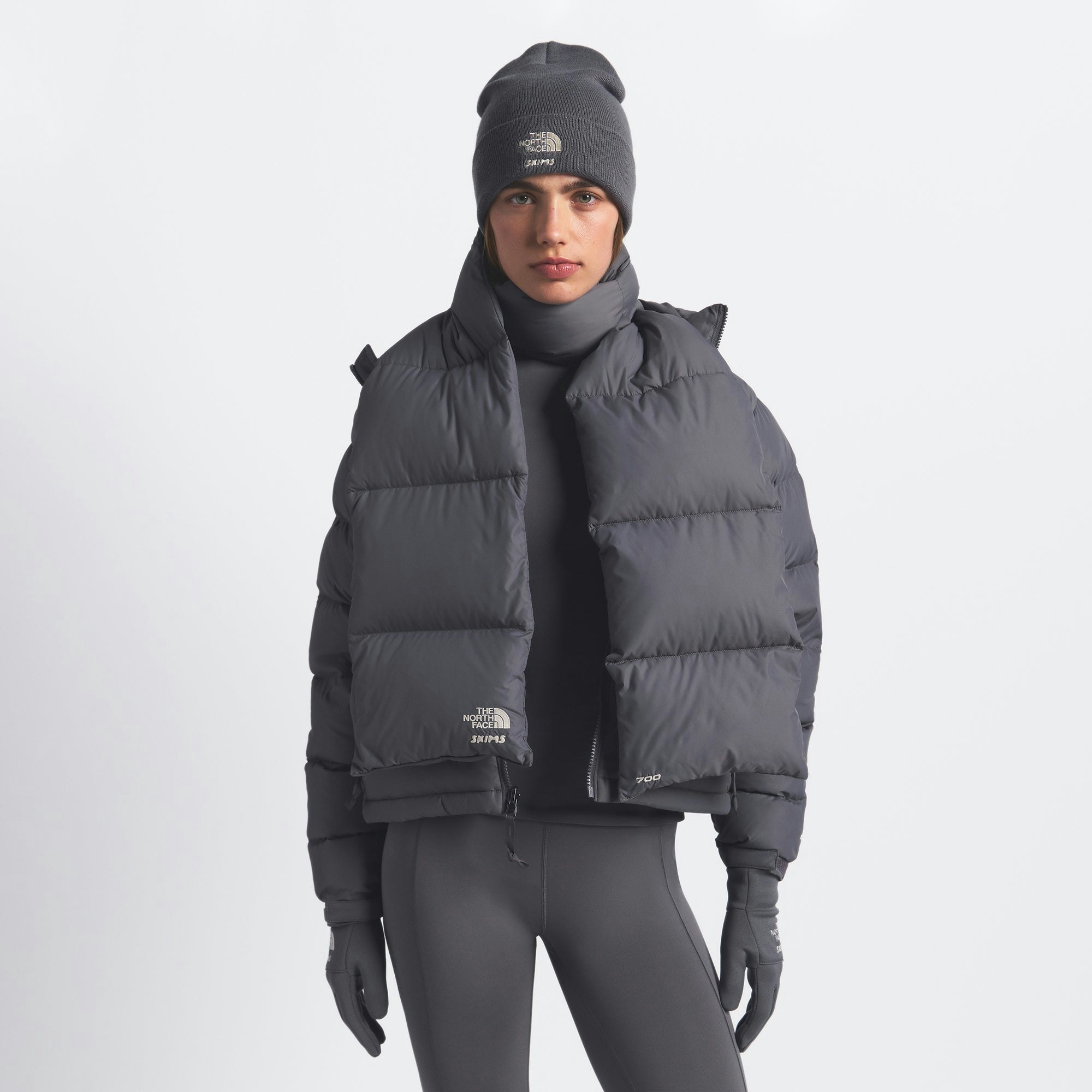 THE NORTH FACE X SKIMS NUPTSE SCARF | GUNMETAL ON A MODEL FRONT VIEW @ | FOCUS: 0.0, 1.0, 0.9