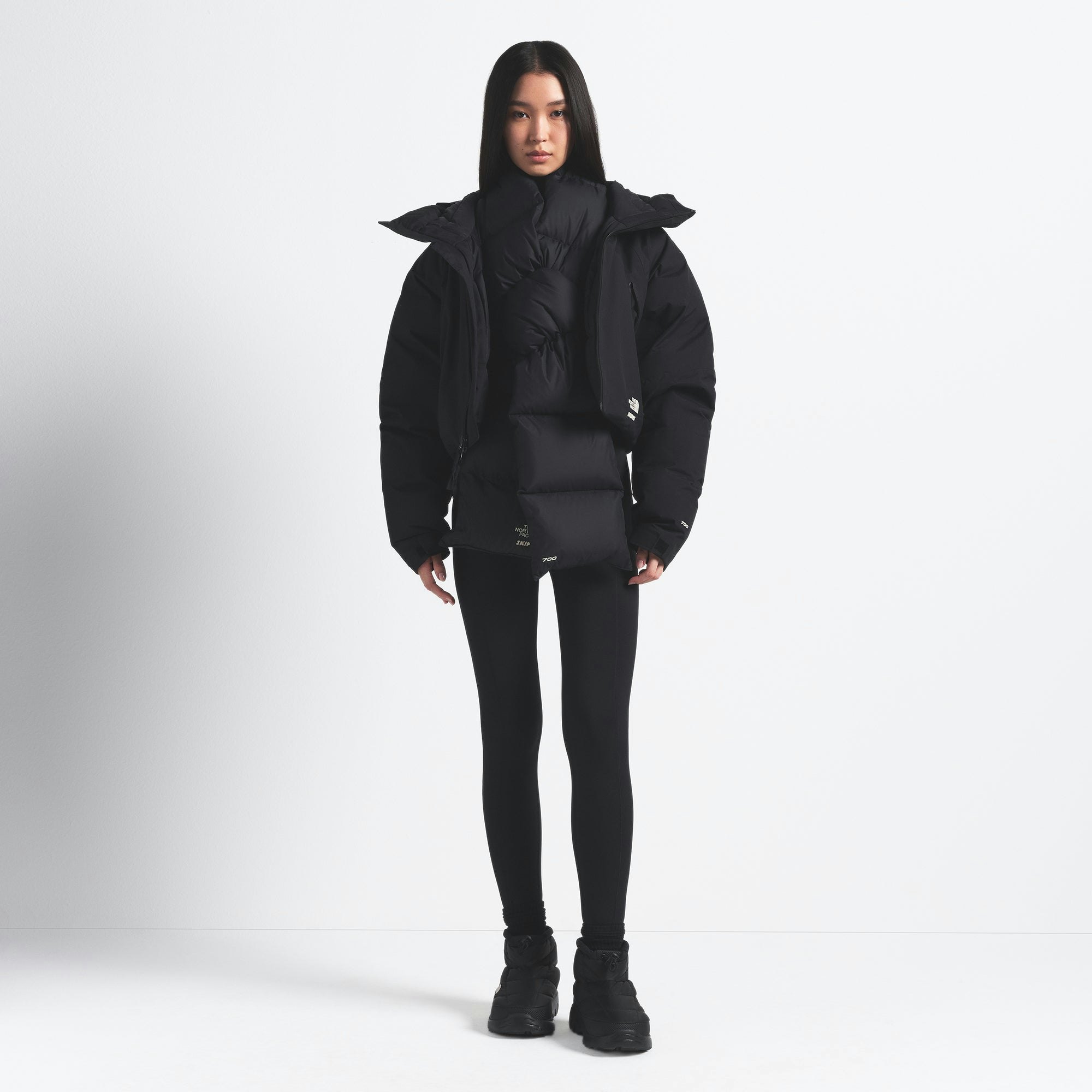 THE NORTH FACE X SKIMS NUPTSE SCARF | ONYX ON A MODEL FRONT VIEW @ | FOCUS: 0.0, 1.0, 0.9