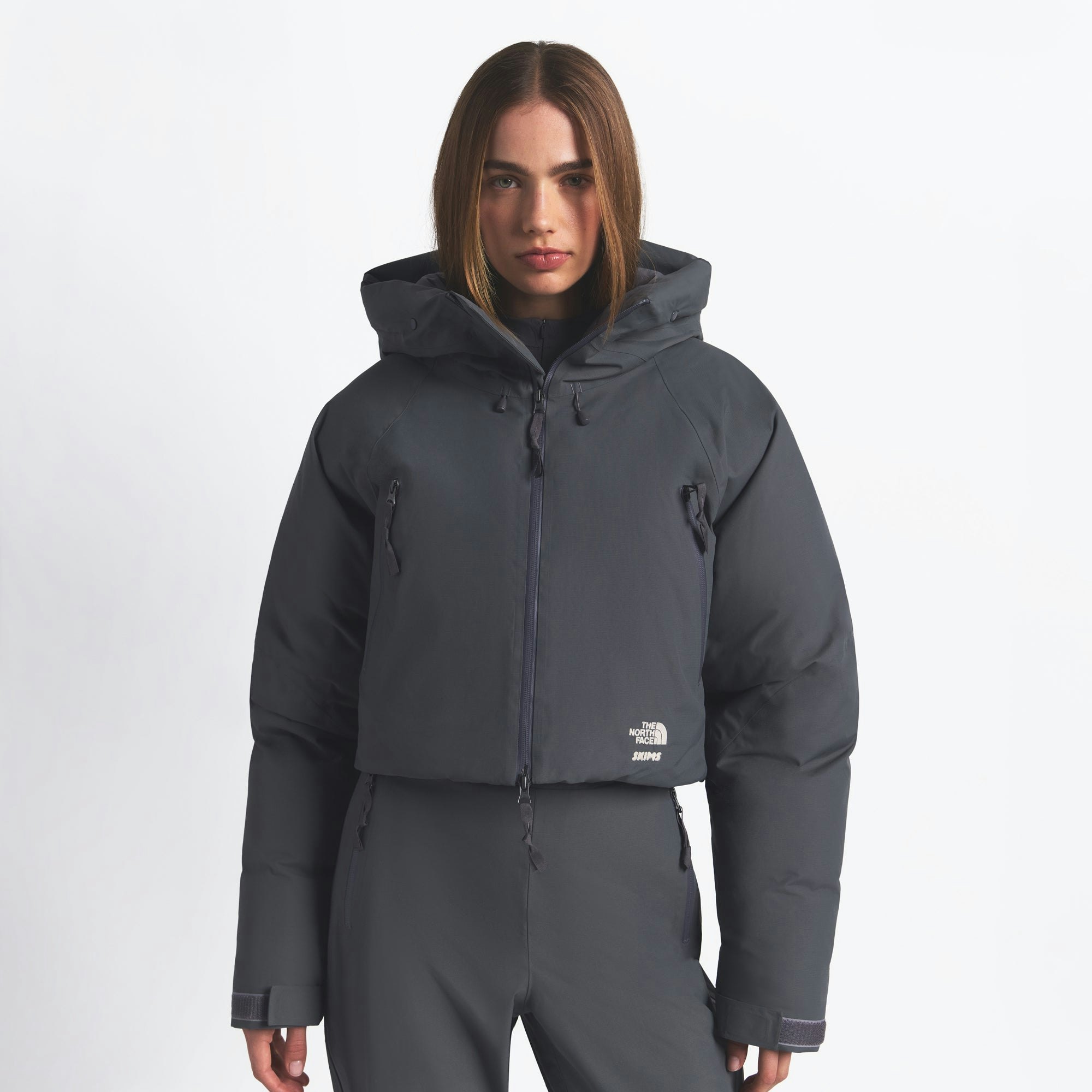 THE NORTH FACE X SKIMS INSULATED SHELL JACKET | GUNMETAL ON A MODEL FRONT VIEW @ | FOCUS: 0.0, 1.0, 0.9