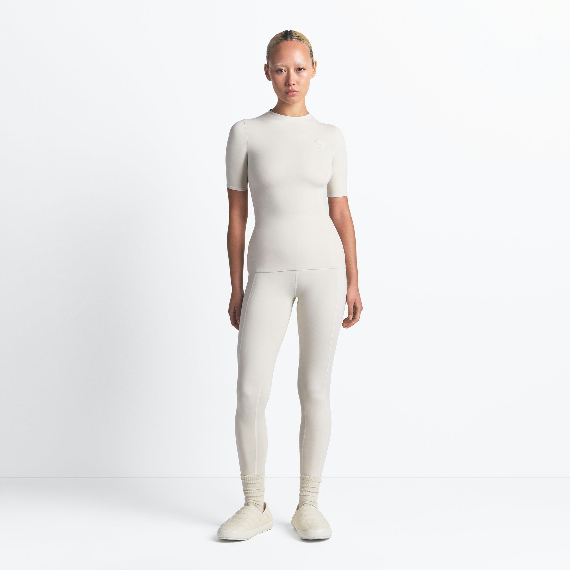 THE NORTH FACE X SKIMS REFINA SHORT SLEEVE TOP | BONE ON A MODEL FRONT VIEW @ | FOCUS: 0.0, 1.0, 0.9