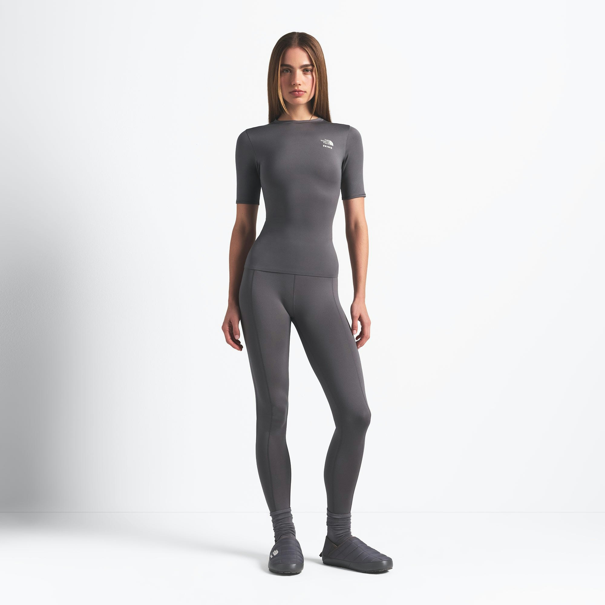 THE NORTH FACE X SKIMS REFINA SHORT SLEEVE TOP | GUNMETAL ON A MODEL FRONT VIEW @ | FOCUS: 0.0, 1.0, 0.9