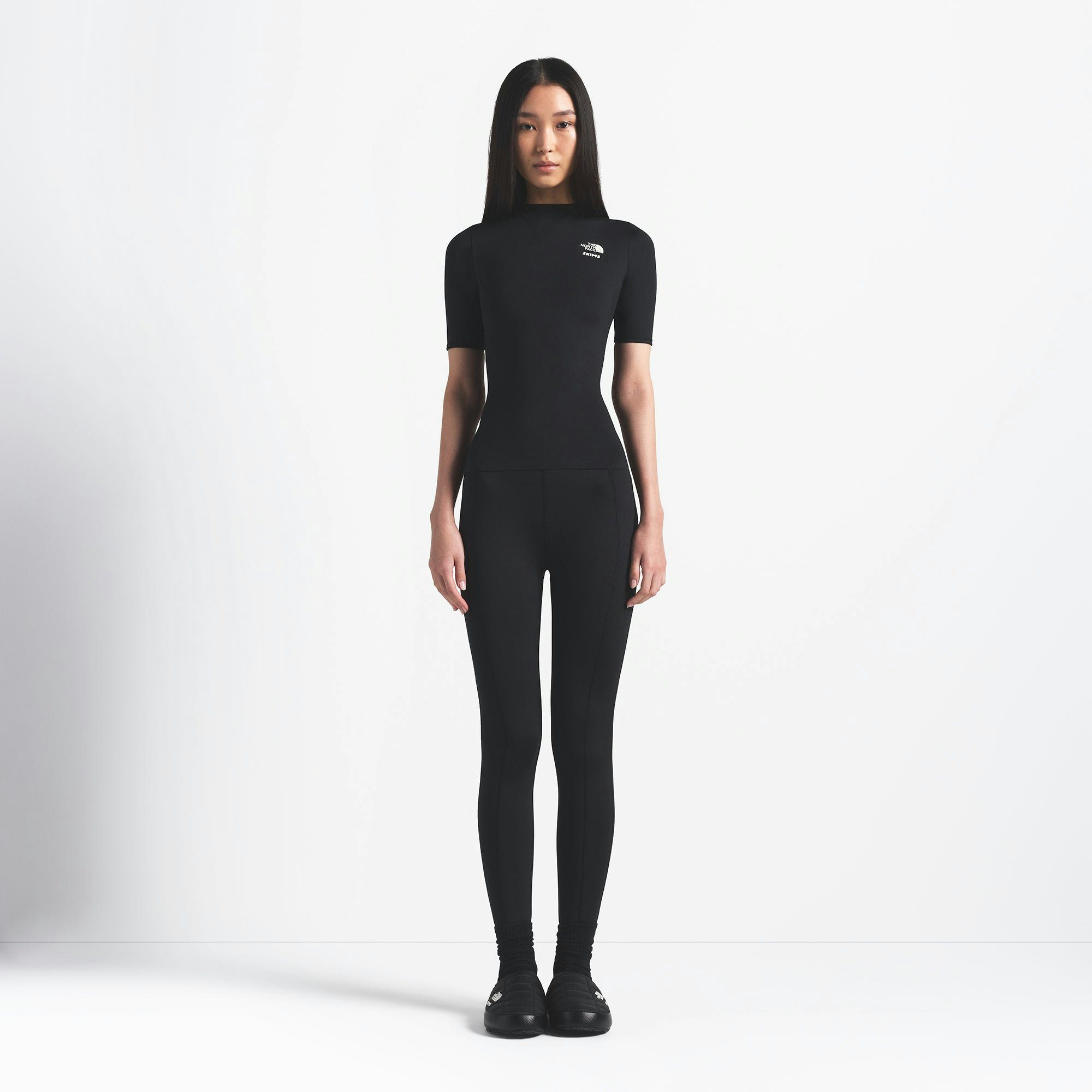 THE NORTH FACE X SKIMS REFINA SHORT SLEEVE TOP | ONYX ON A MODEL FRONT VIEW @ | FOCUS: 0.0, 1.0, 0.9