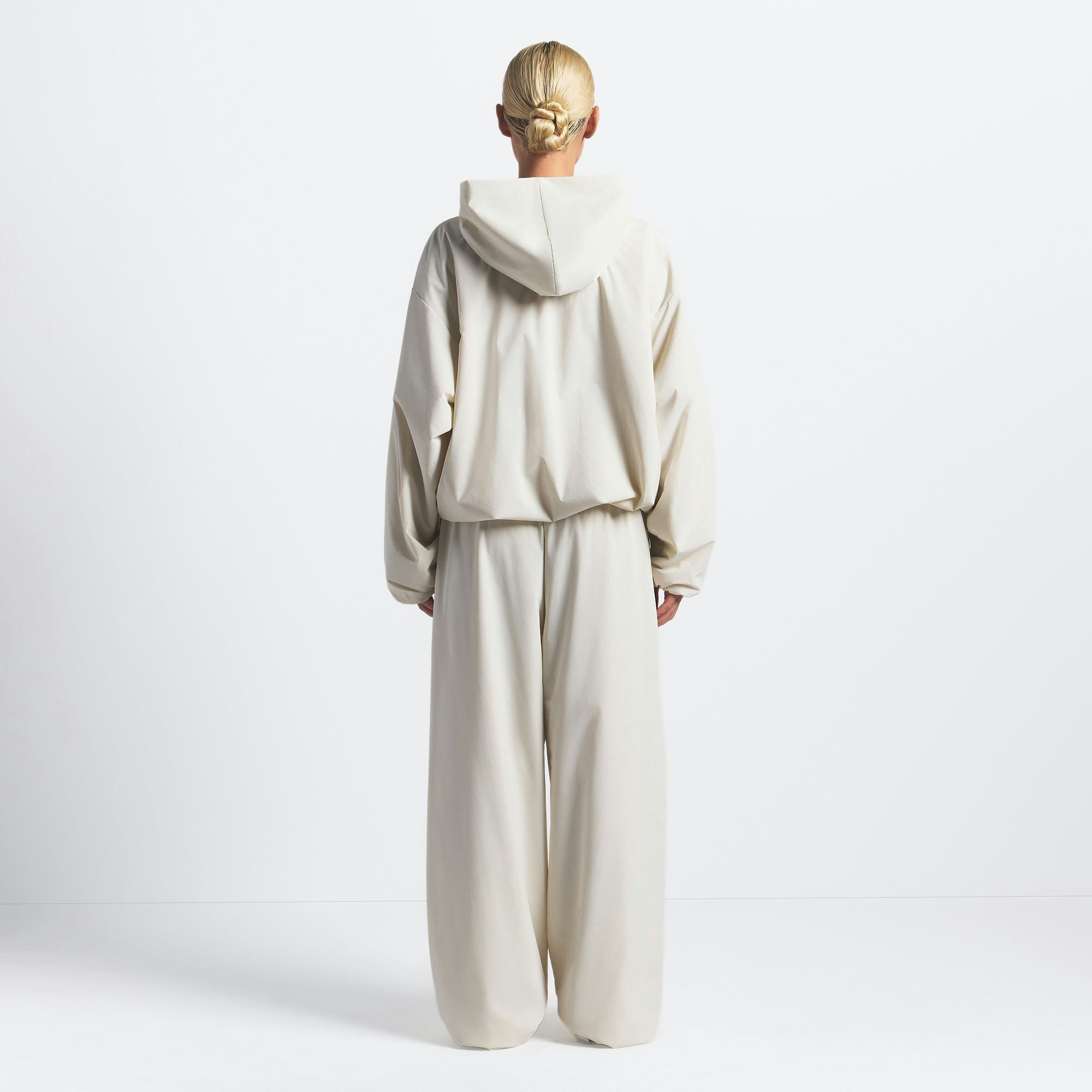 THE NORTH FACE X SKIMS VENTRIX HOODIE | BONE ON A MODEL BACK VIEW @ | FOCUS: 0.0, 1.0, 0.9