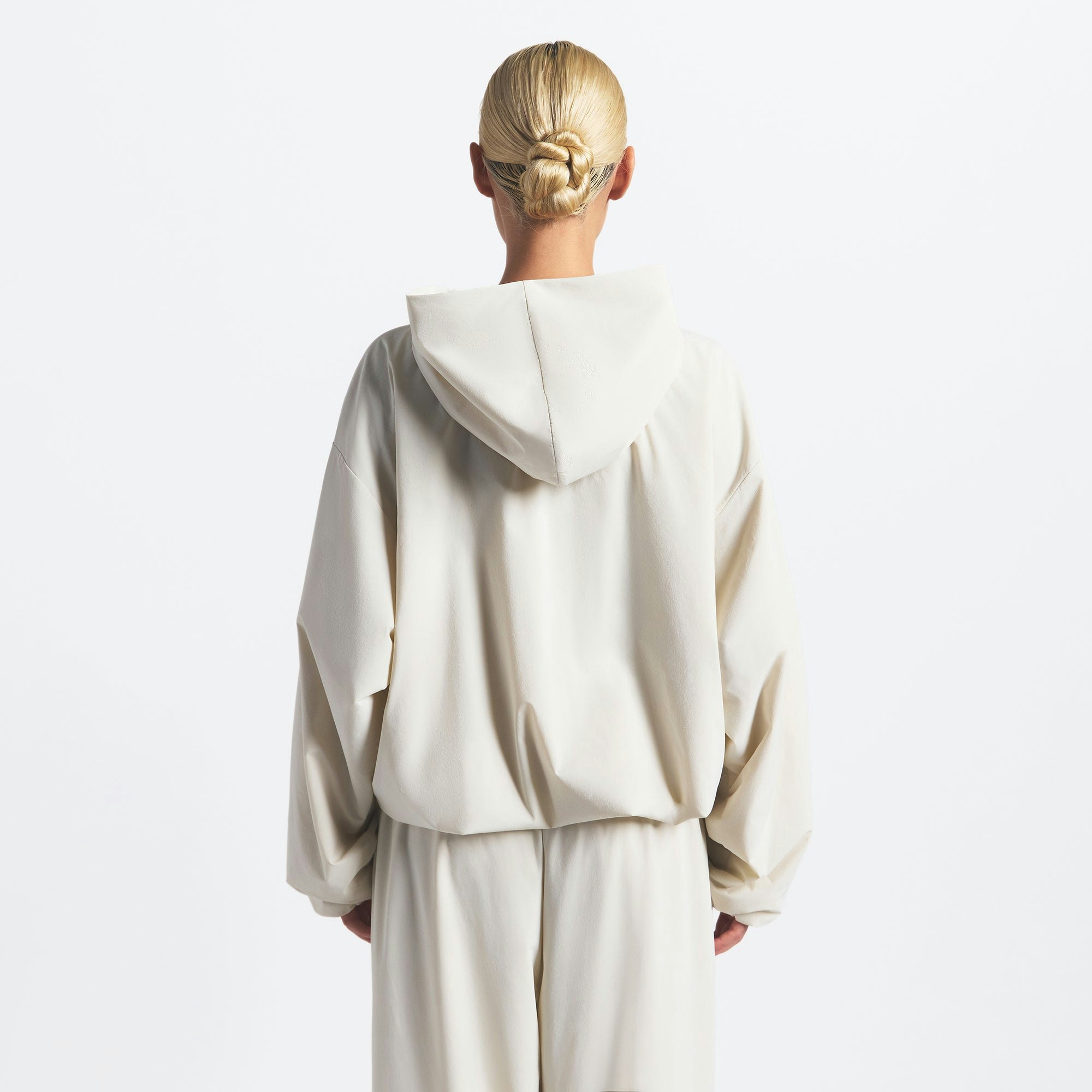 THE NORTH FACE X SKIMS VENTRIX HOODIE | BONE ON A MODEL BACK VIEW @ | FOCUS: 0.0, 1.0, 0.9