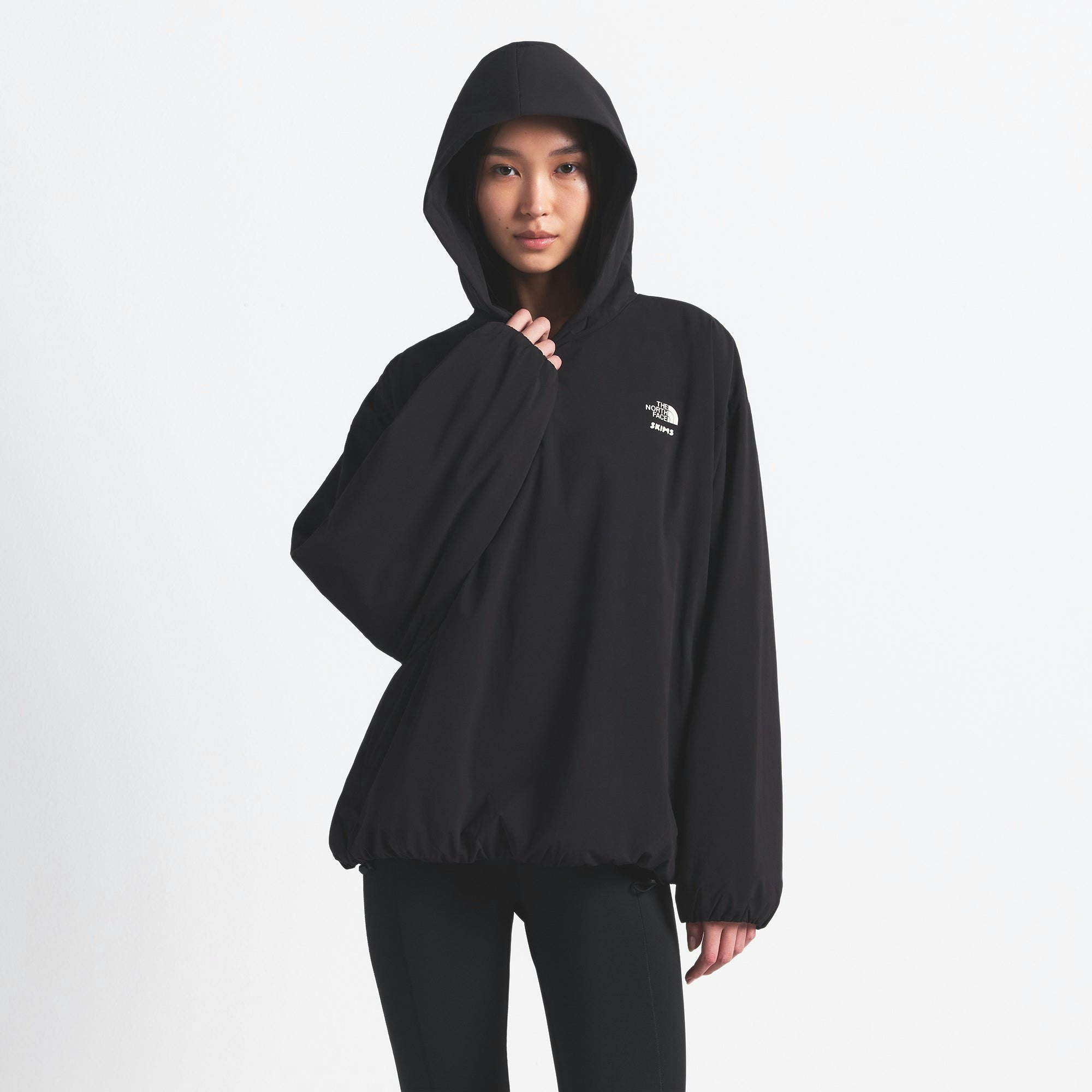 THE NORTH FACE X SKIMS VENTRIX HOODIE | ONYX ON A MODEL FRONT VIEW @ | FOCUS: 0.0, 1.0, 0.9