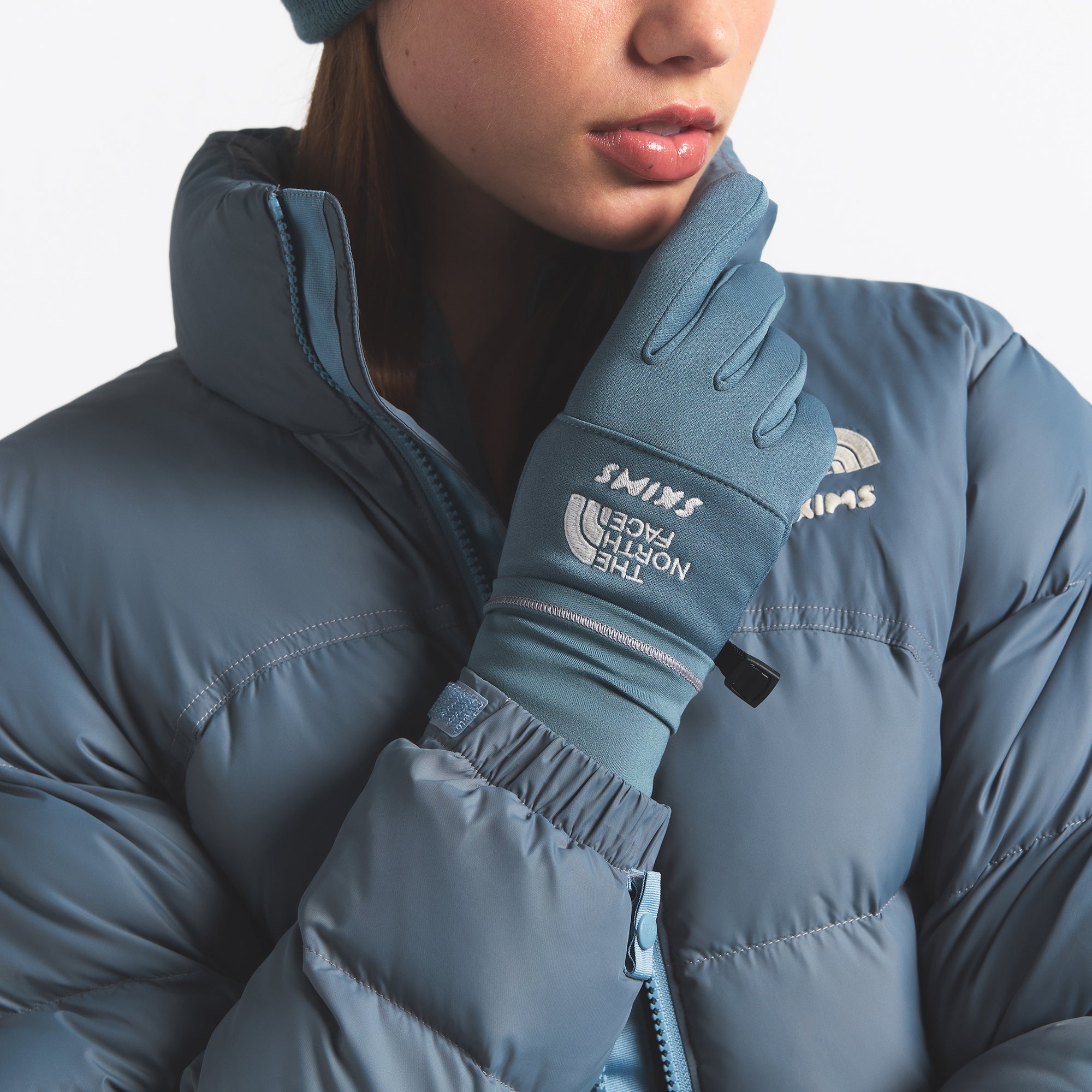 THE NORTH FACE X SKIMS GLOVES | KYANITE ON A MODEL FRONT VIEW @ | FOCUS: 0.0, 1.0, 0.9