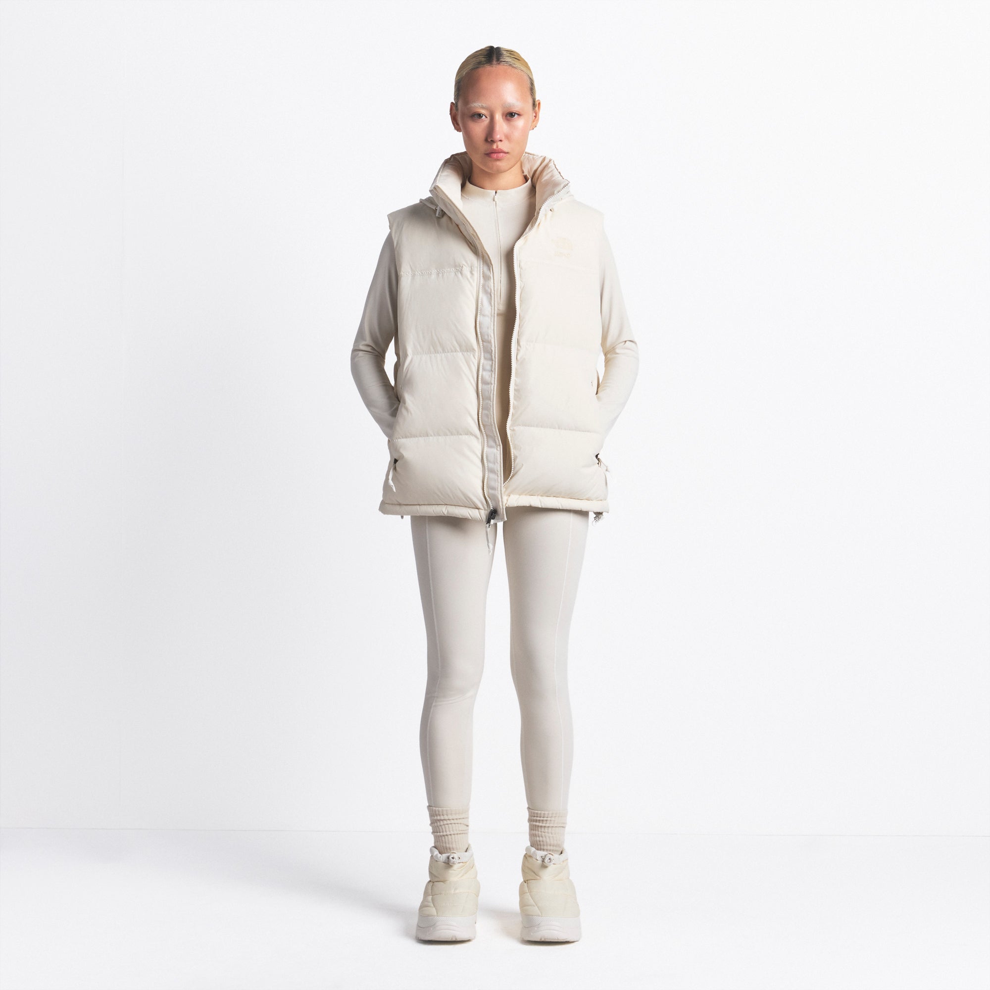 THE NORTH FACE X SKIMS 1996 NUPTSE VEST | BONE ON A MODEL FRONT VIEW @ | FOCUS: 0.0, 1.0, 0.9