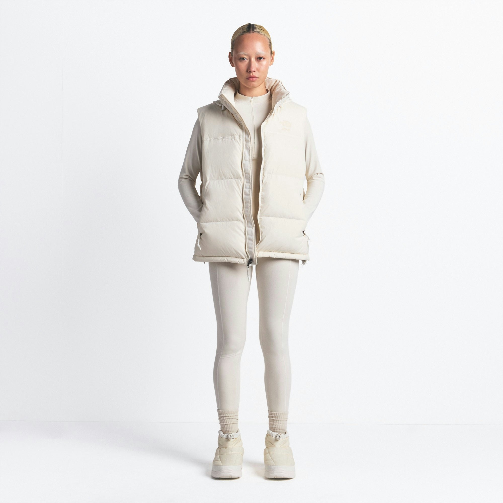 THE NORTH FACE X SKIMS 1996 NUPTSE VEST | BONE ON A MODEL FRONT VIEW @ | FOCUS: 0.0, 1.0, 0.9