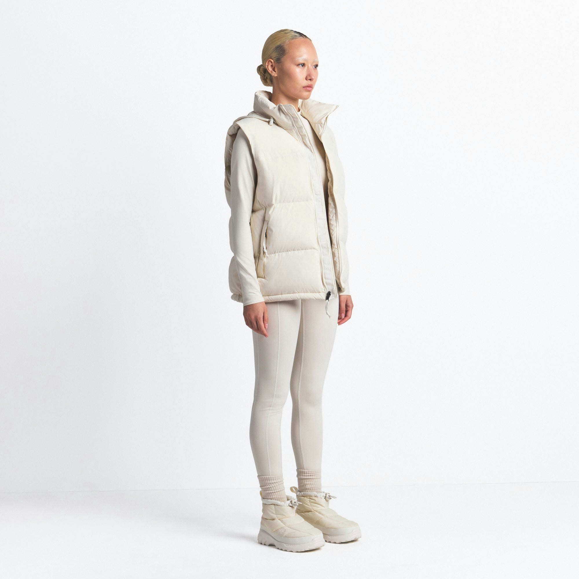 THE NORTH FACE X SKIMS 1996 NUPTSE VEST | BONE ON A MODEL FRONT VIEW @ | FOCUS: 0.0, 1.0, 0.9