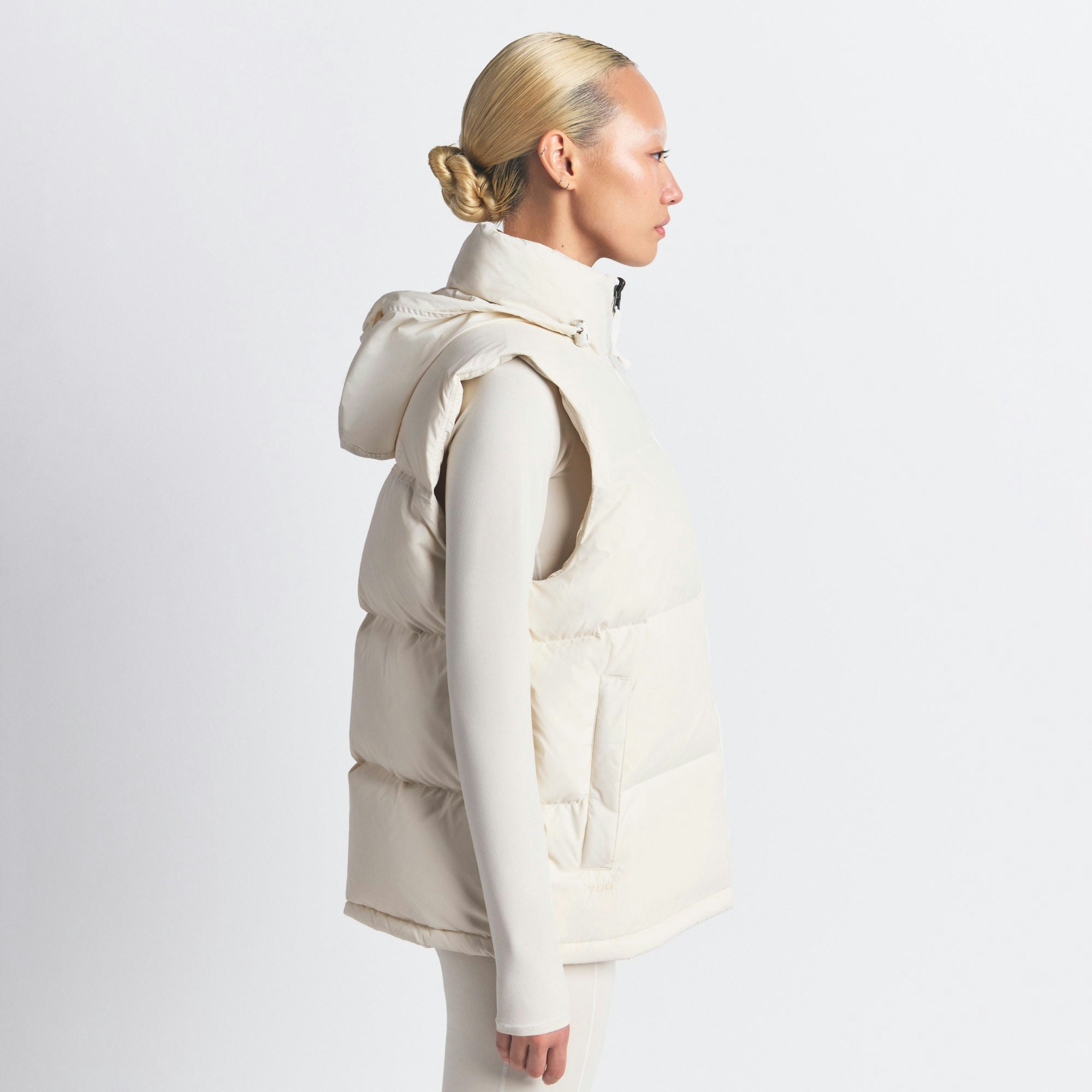 THE NORTH FACE X SKIMS 1996 NUPTSE VEST | BONE ON A MODEL FRONT VIEW @ | FOCUS: 0.0, 1.0, 0.9