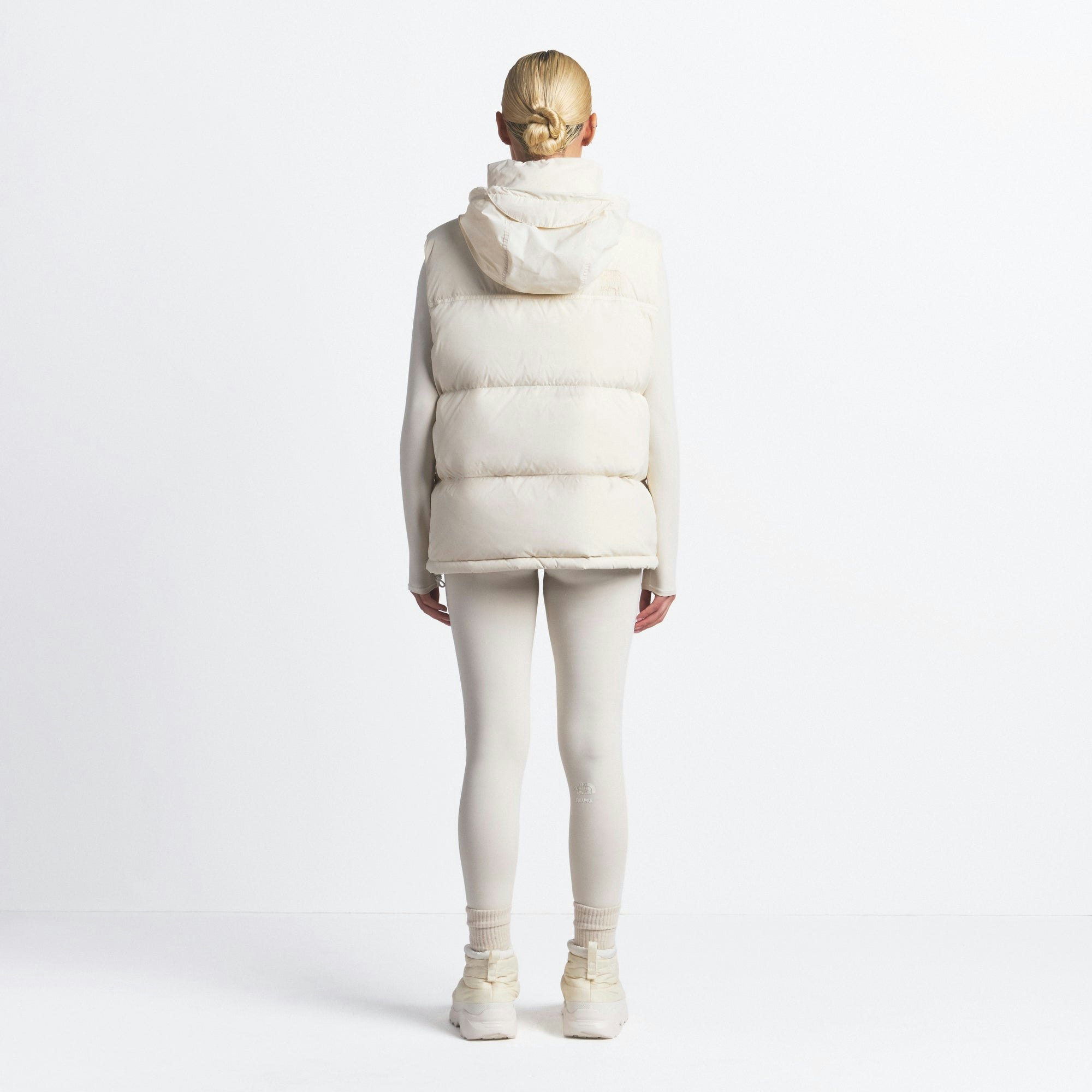 THE NORTH FACE X SKIMS 1996 NUPTSE VEST | BONE ON A MODEL FRONT VIEW @ | FOCUS: 0.0, 1.0, 0.9