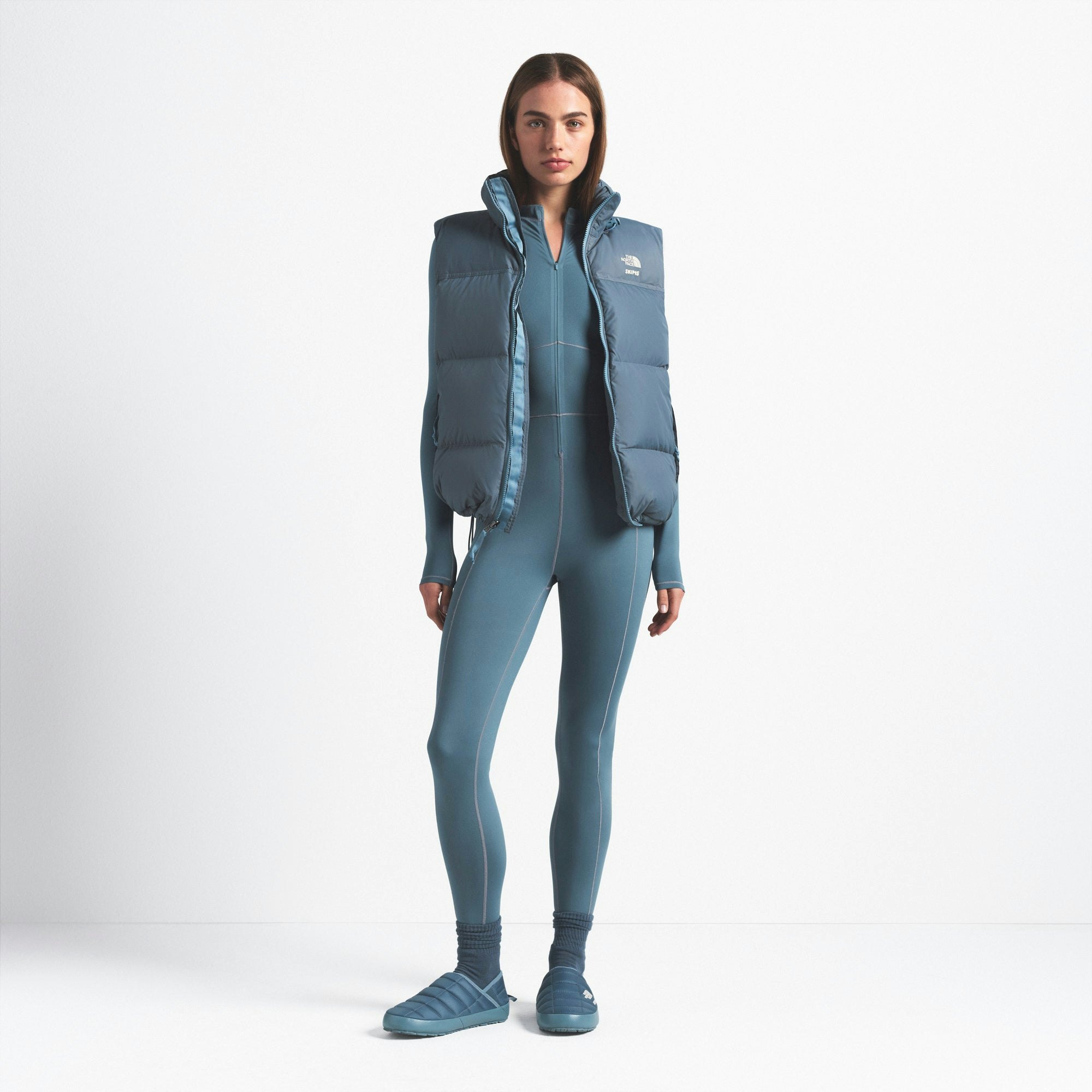 THE NORTH FACE X SKIMS 1996 NUPTSE VEST | KYANITE ON A MODEL FRONT VIEW @ | FOCUS: 0.0, 1.0, 0.9