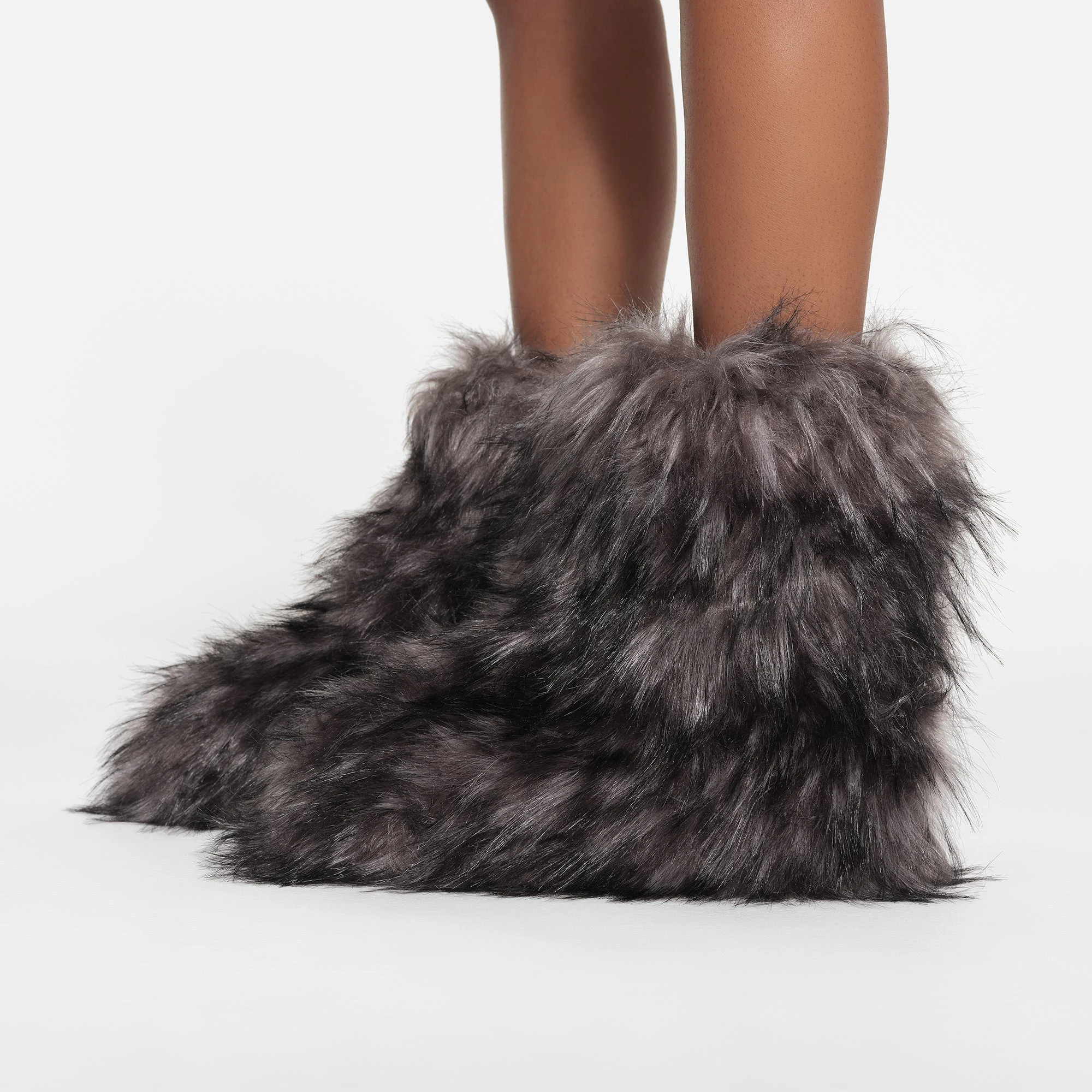 FAUX FUR BOOT | GREY ON A MODEL SIDE VIEW