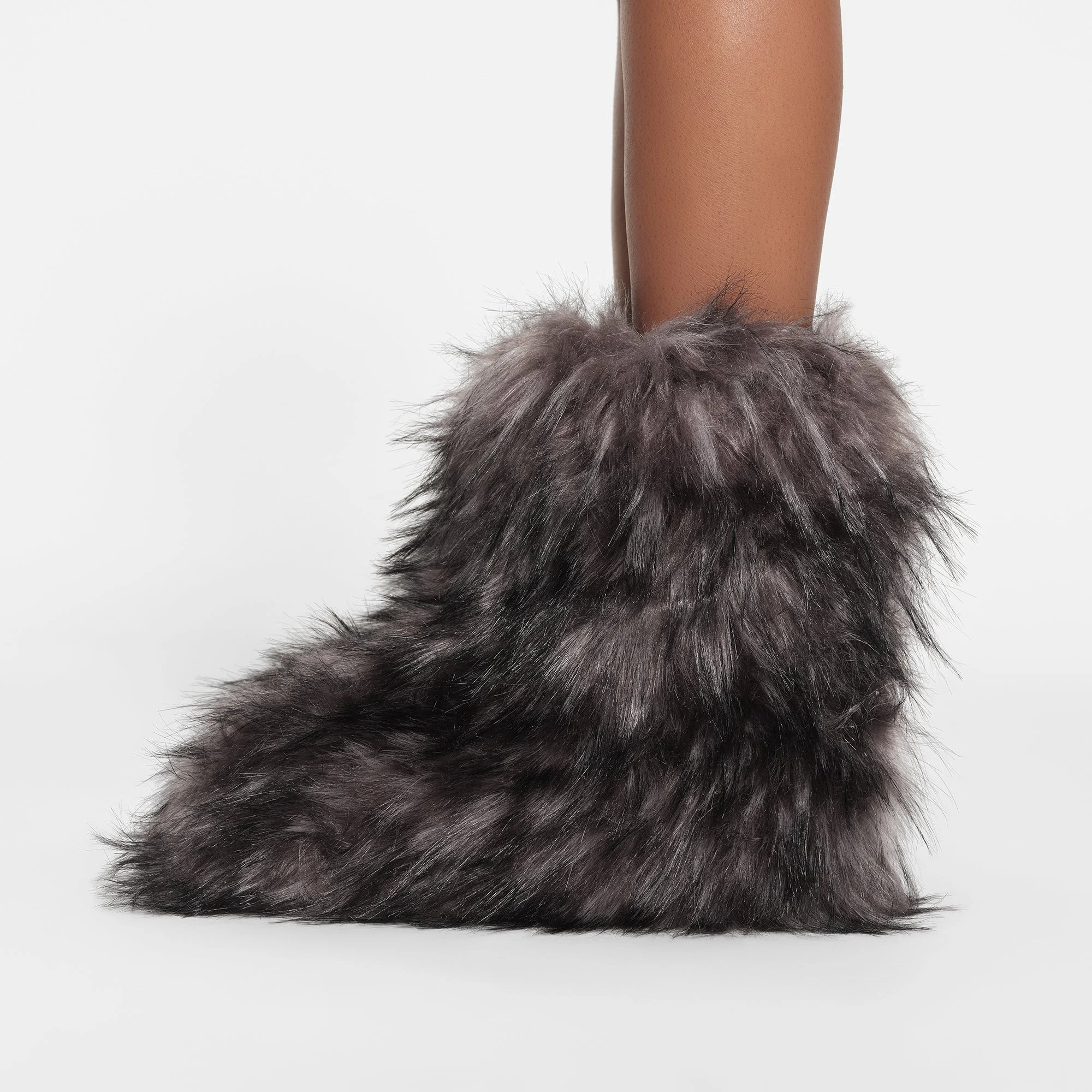 FAUX FUR BOOT | GREY ON A MODEL SIDE VIEW