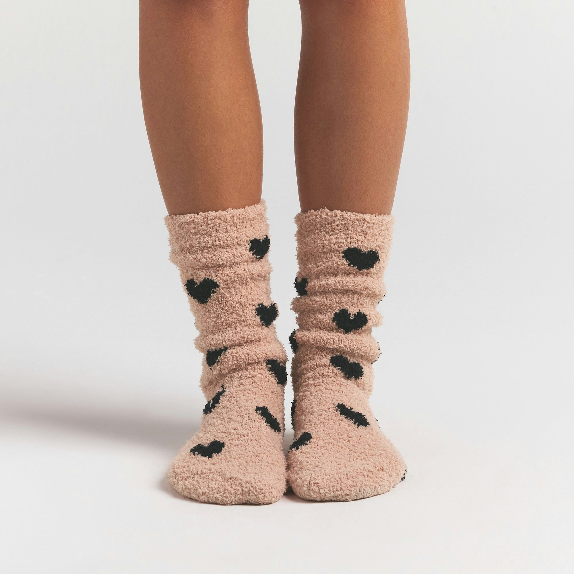 COZY KNIT SOCK | MICA SPACED HEARTS ON A MODEL FRONT VIEW @ | FOCUS: 0.0, 1.0, 0.9