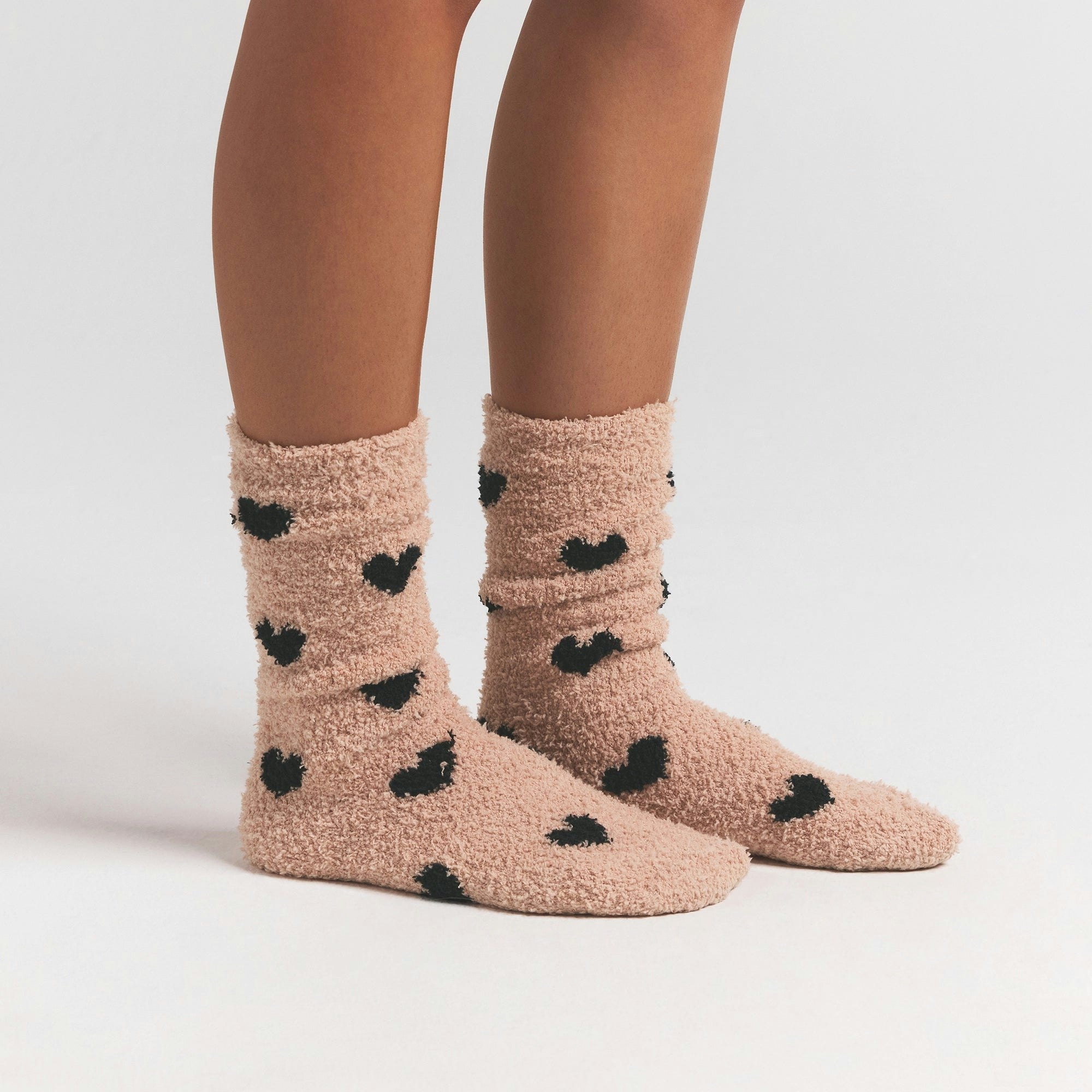 COZY KNIT SOCK | MICA SPACED HEARTS ON A MODEL FRONT VIEW @ | FOCUS: 0.0, 1.0, 0.9